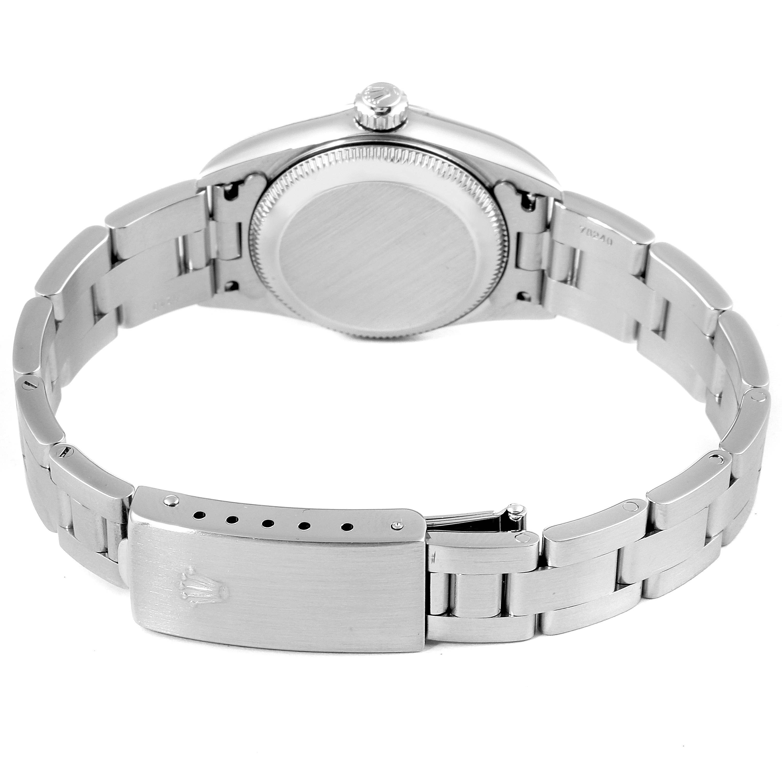 The image shows the back view of a Rolex Oyster Perpetual 76080 Women's Stainless Steel Pink Dial 76080 Women's Stainless Steel Pink Dial watch, highlighting its case back and bracelet.