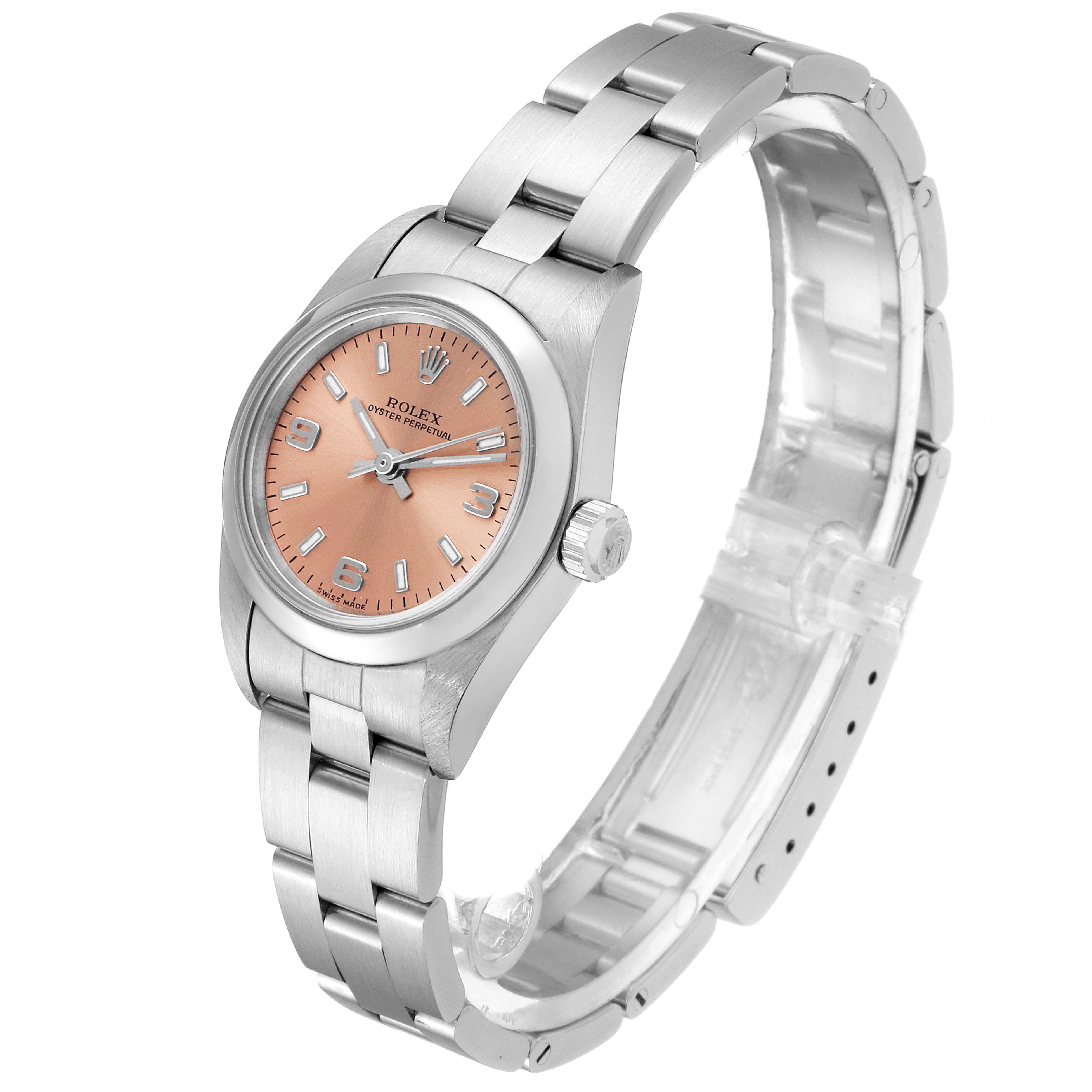 This image shows a Rolex Oyster Perpetual 76080 Women's Stainless Steel Pink Dial 76080 Women's Stainless Steel Pink Dial watch at a side angle displaying the dial, case, crown, and bracelet.