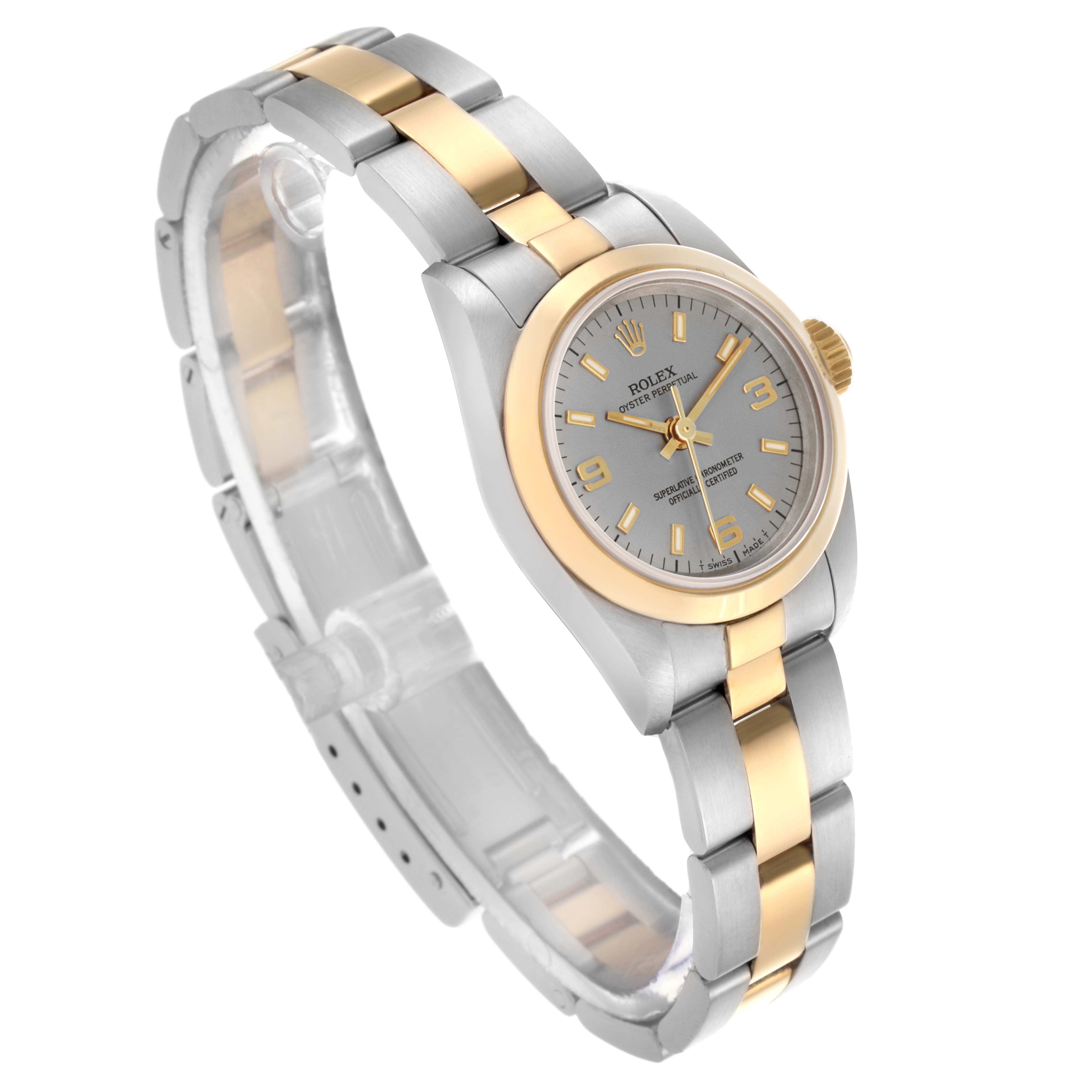 The Rolex Oyster Perpetual 67183 Women's Steel and Gold (two tone) Grey Dial 67183 Women's Steel and Gold (two tone) Grey Dial watch is shown from a three-quarter angle, highlighting the face, bezel, and bracelet.