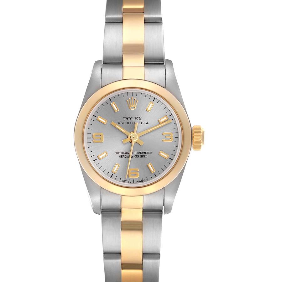 The Rolex Oyster Perpetual watch is shown from a front angle, displaying its two-tone bracelet and gold-accented bezel.