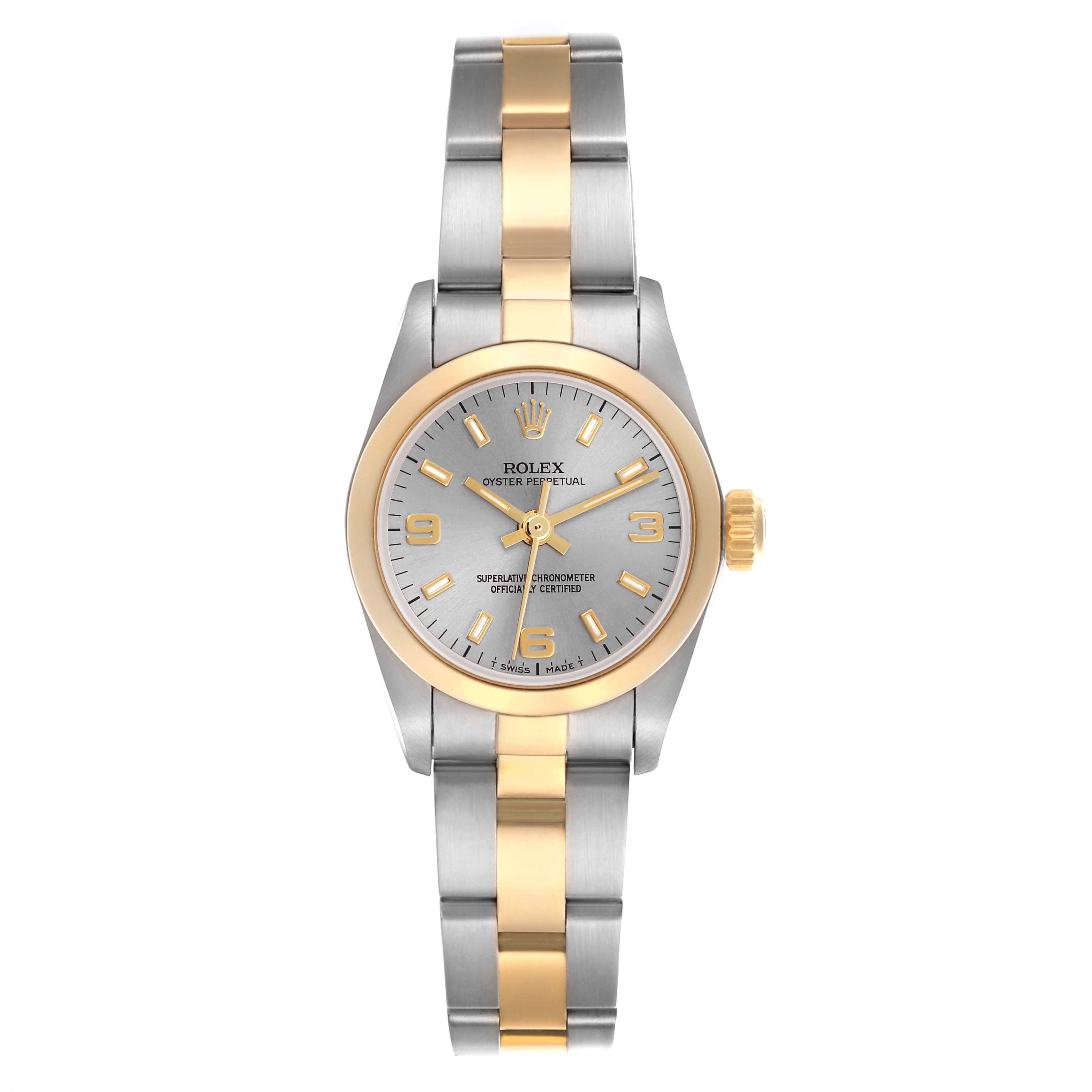 The Rolex Oyster Perpetual 67183 Women's Steel and Gold (two tone) Grey Dial 67183 Women's Steel and Gold (two tone) Grey Dial watch is shown from a front angle, highlighting the dial, bezel, and two-tone bracelet.