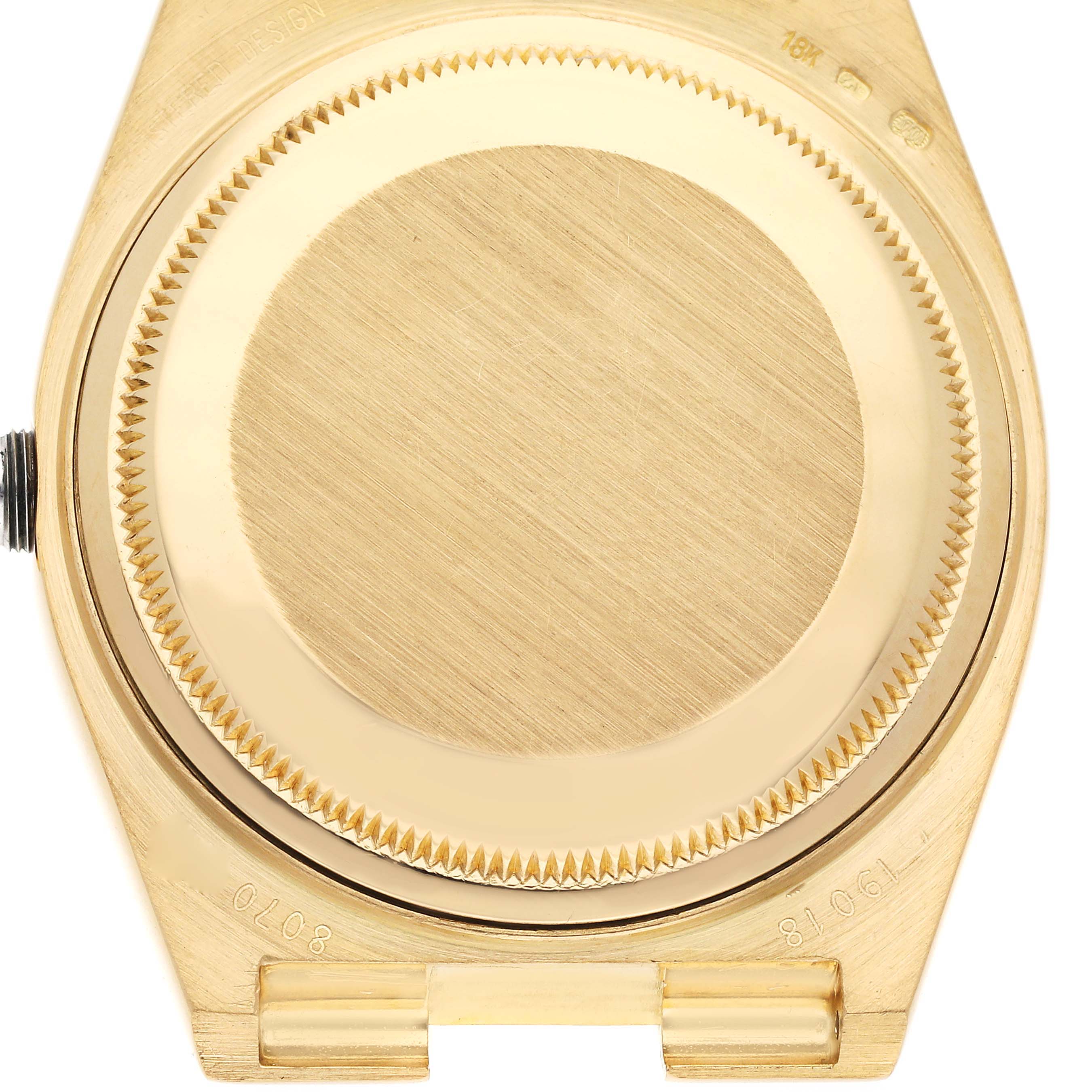The image shows the back case of a Rolex Oysterquartz 19018 Men's Yellow Gold Champagne Dial 19018 Men's Yellow Gold Champagne Dial watch, viewed from behind.