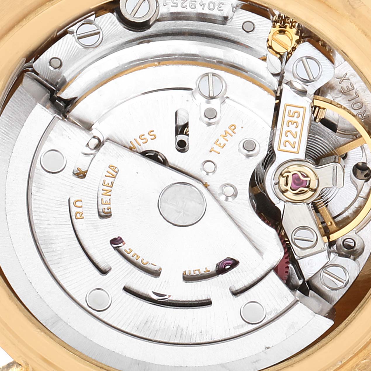 This close-up image shows the internal movement mechanisms of the Rolex Pearlmaster 80318 Women's Yellow Gold Champagne Dial 80318 Women's Yellow Gold Champagne Dial watch, including the rotor and balance wheel.