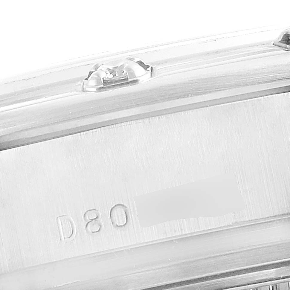 This is a close-up angle of the side of a Rolex Pearlmaster 80319 Women's White Gold White Dial 80319 Women's White Gold White Dial watch, showing part of the serial number.