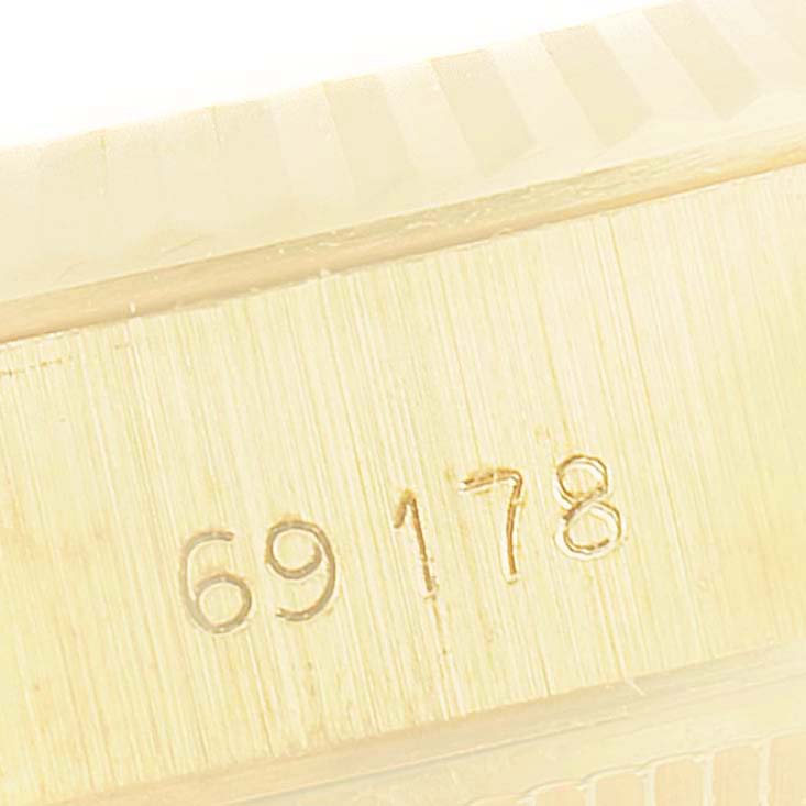 The image shows the reference number "69178" engraved on the Rolex President 69178 Women
s Yellow Gold White Dial 69178 Women
s Yellow Gold White Dial model watch case.
