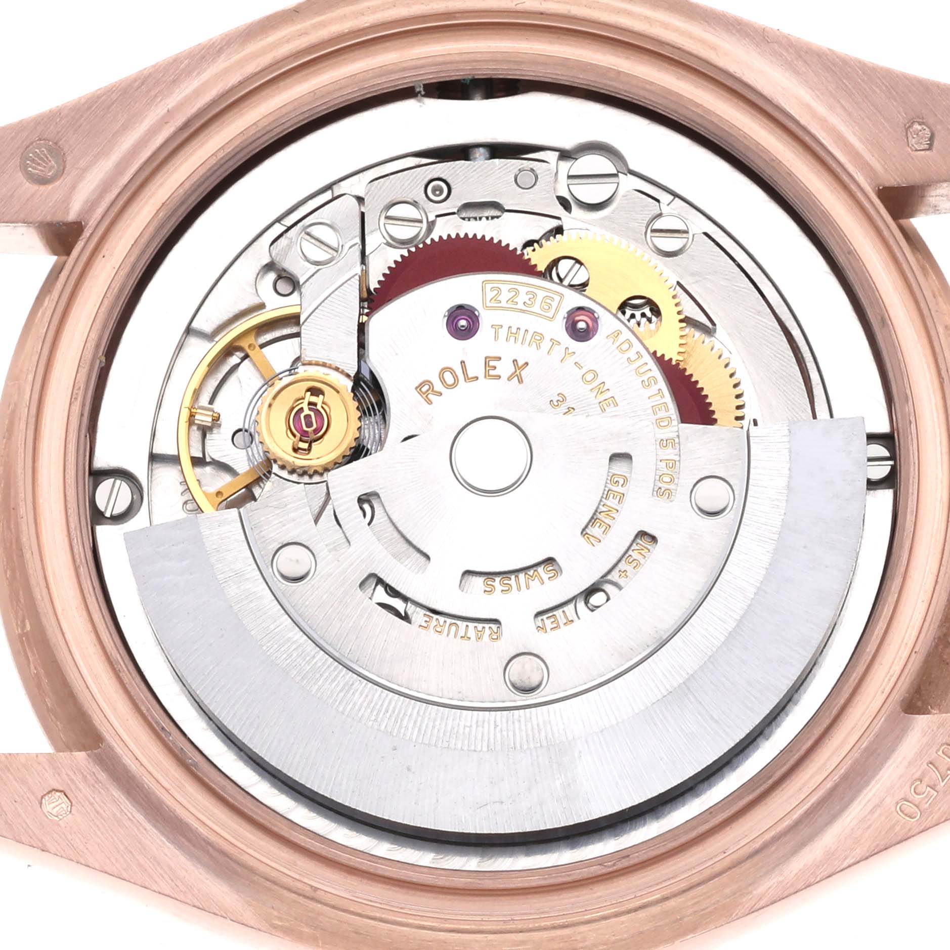 This image shows the internal movement mechanism of a Mid-Size Rolex watch from a top-down perspective.