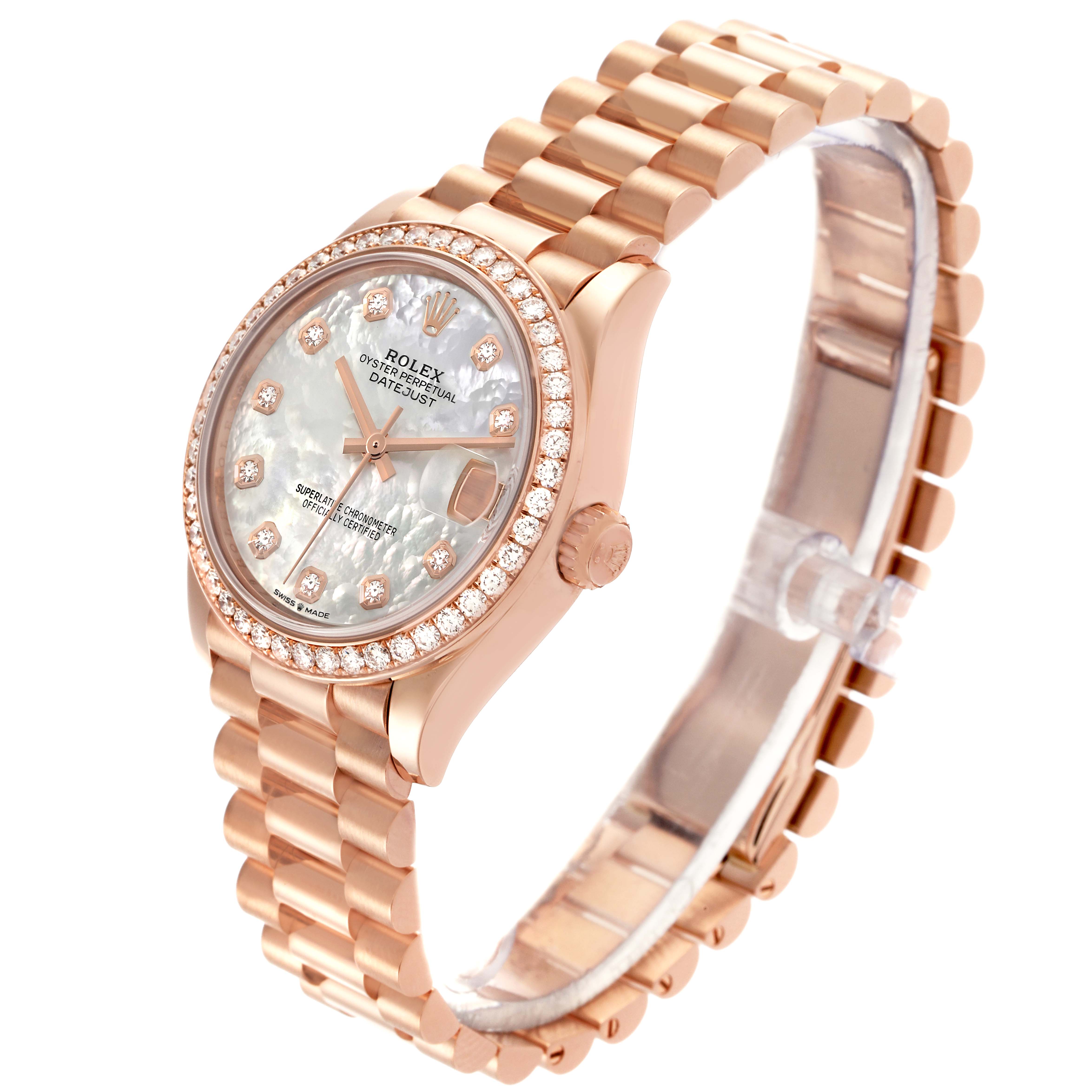 The Rolex Mid-Size watch is shown at an angled side view, displaying the face, bezel, and bracelet.