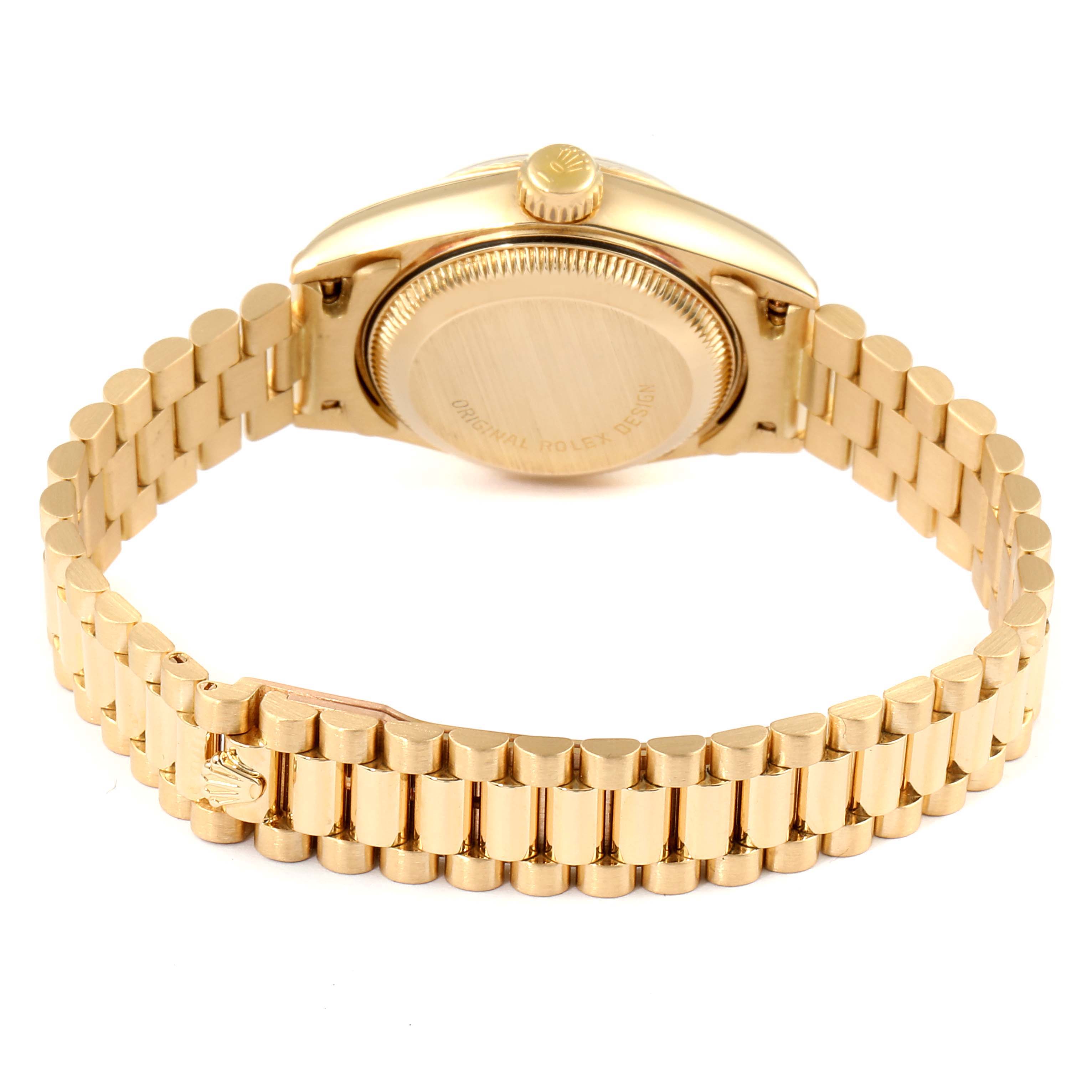 This Rolex President 69178 Women
s Yellow Gold Champagne Dial 69178 Women
s Yellow Gold Champagne Dial watch is shown from the back, highlighting its gold case and bracelet.