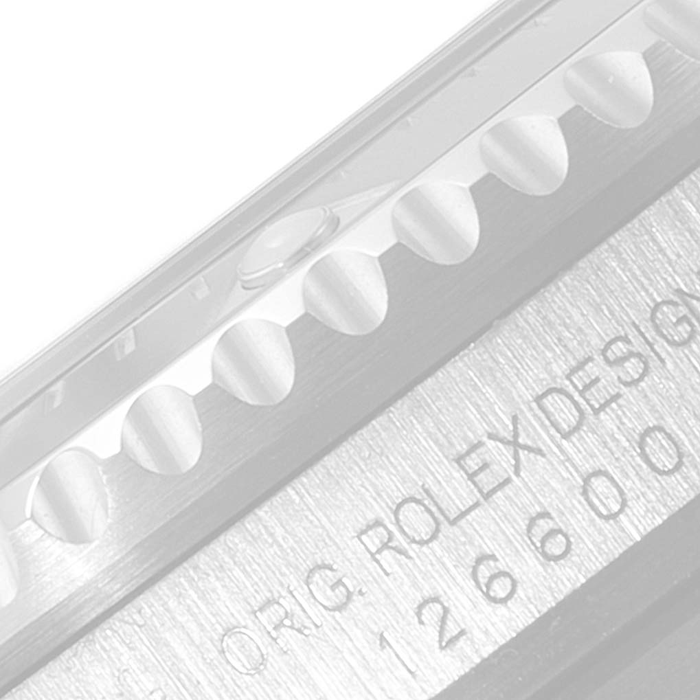 This image shows a close-up of the bezel and engraved side of the Rolex Sea-Dweller 126600 Men's Stainless Steel Black Dial 126600 Men's Stainless Steel Black Dial watch.