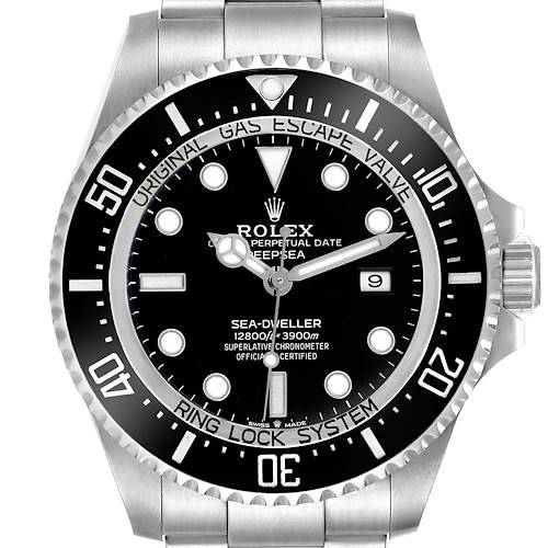 The Rolex Sea-Dweller watch is shown from the front, displaying the dial, bezel, crown, and part of the bracelet.