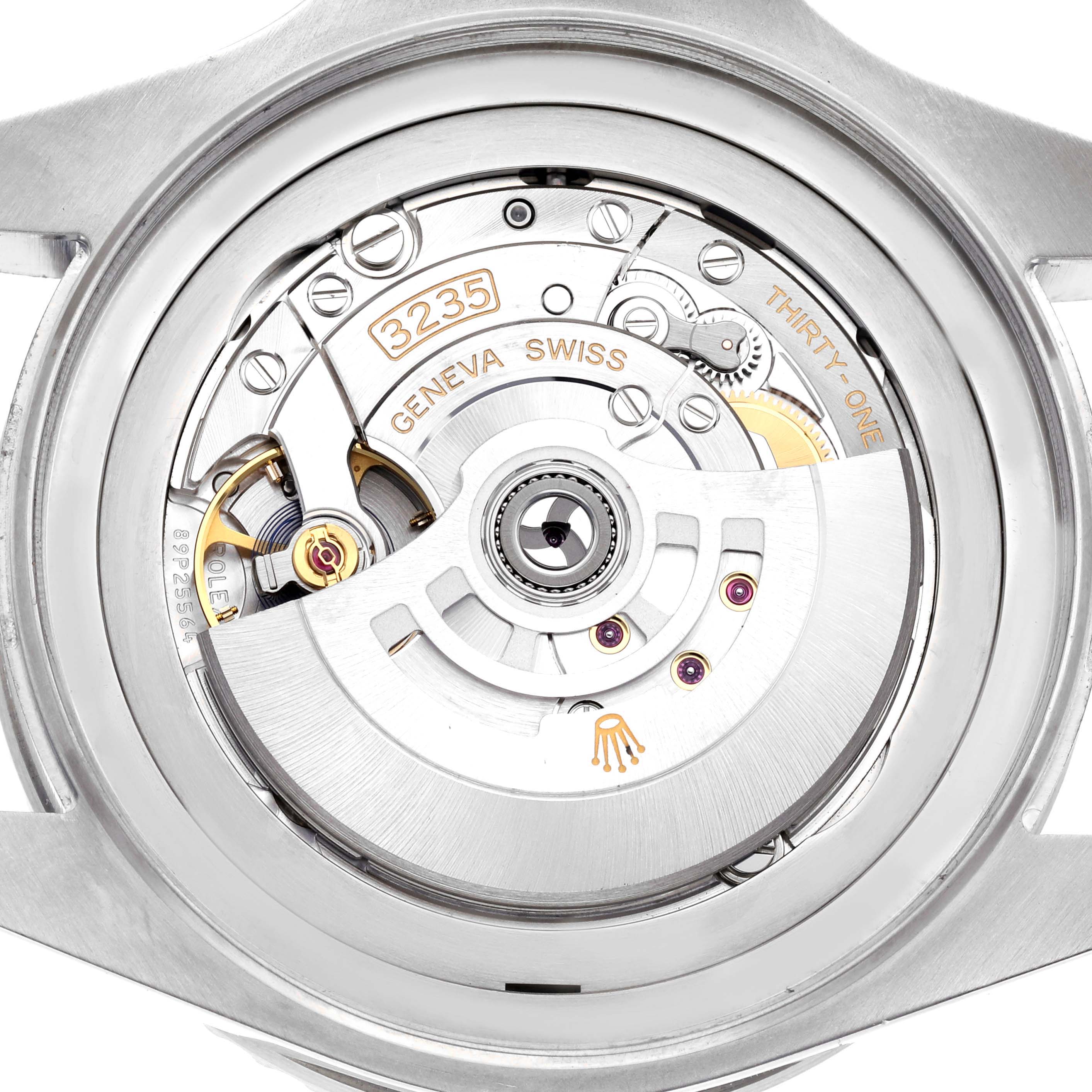 The image shows the back view of a Rolex Sea-Dweller 126660 Men's Stainless Steel Black Dial 126660 Men's Stainless Steel Black Dial watch, revealing its movement and rotor mechanism.