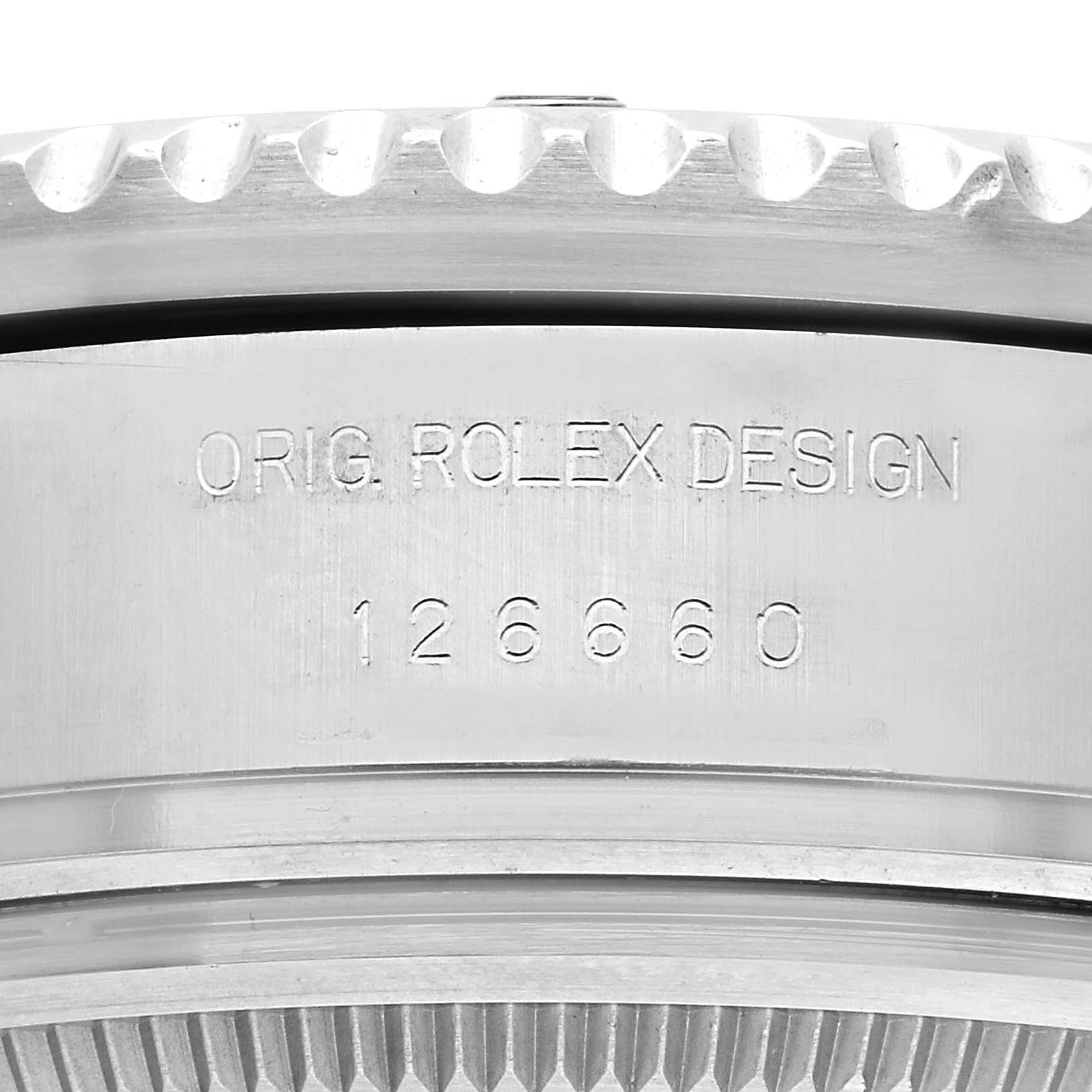 The image shows an angled view of the Rolex Sea-Dweller 126660 Men's Stainless Steel Black Dial 126660 Men's Stainless Steel Black Dial's case with "ORIG. ROLEX DESIGN" and model number 126660 engraved.