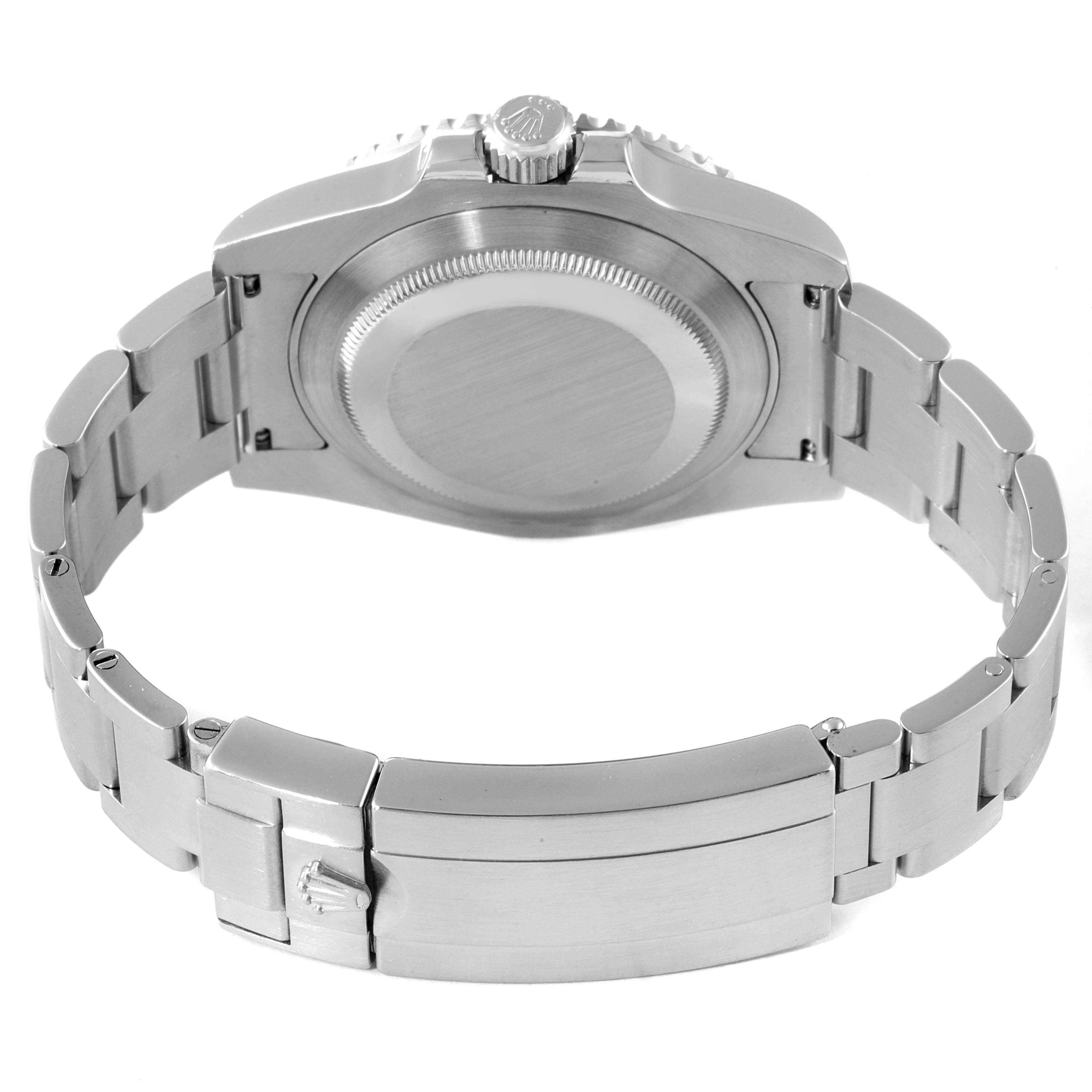 The image shows the back and bracelet of a Rolex Submariner 114060 Men
s Stainless Steel Black Dial 114060 Men
s Stainless Steel Black Dial watch at an angle displaying its caseback and clasp.