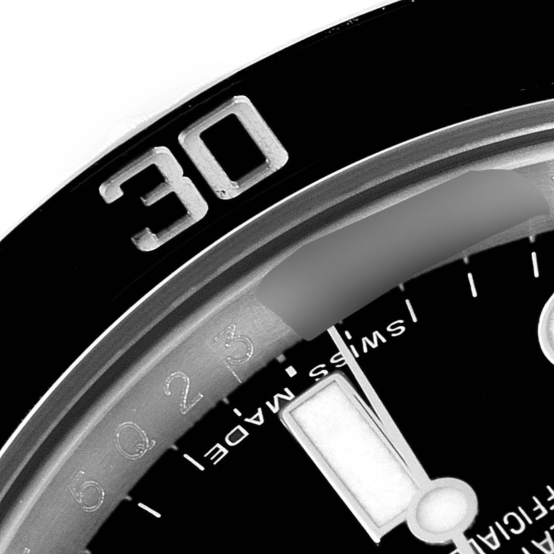 The image shows a close-up of the bezel and part of the dial of a Rolex Submariner 114060 Men
s Stainless Steel Black Dial 114060 Men
s Stainless Steel Black Dial watch.