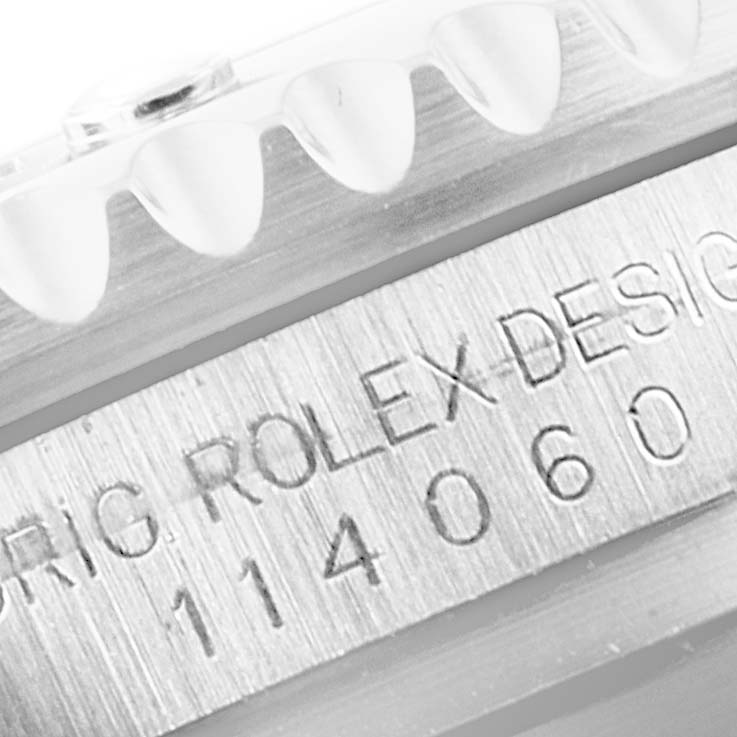 This close-up angle shows the engraved edge and crown of the Rolex Submariner 114060 Men
s Stainless Steel Black Dial 114060 Men
s Stainless Steel Black Dial model.