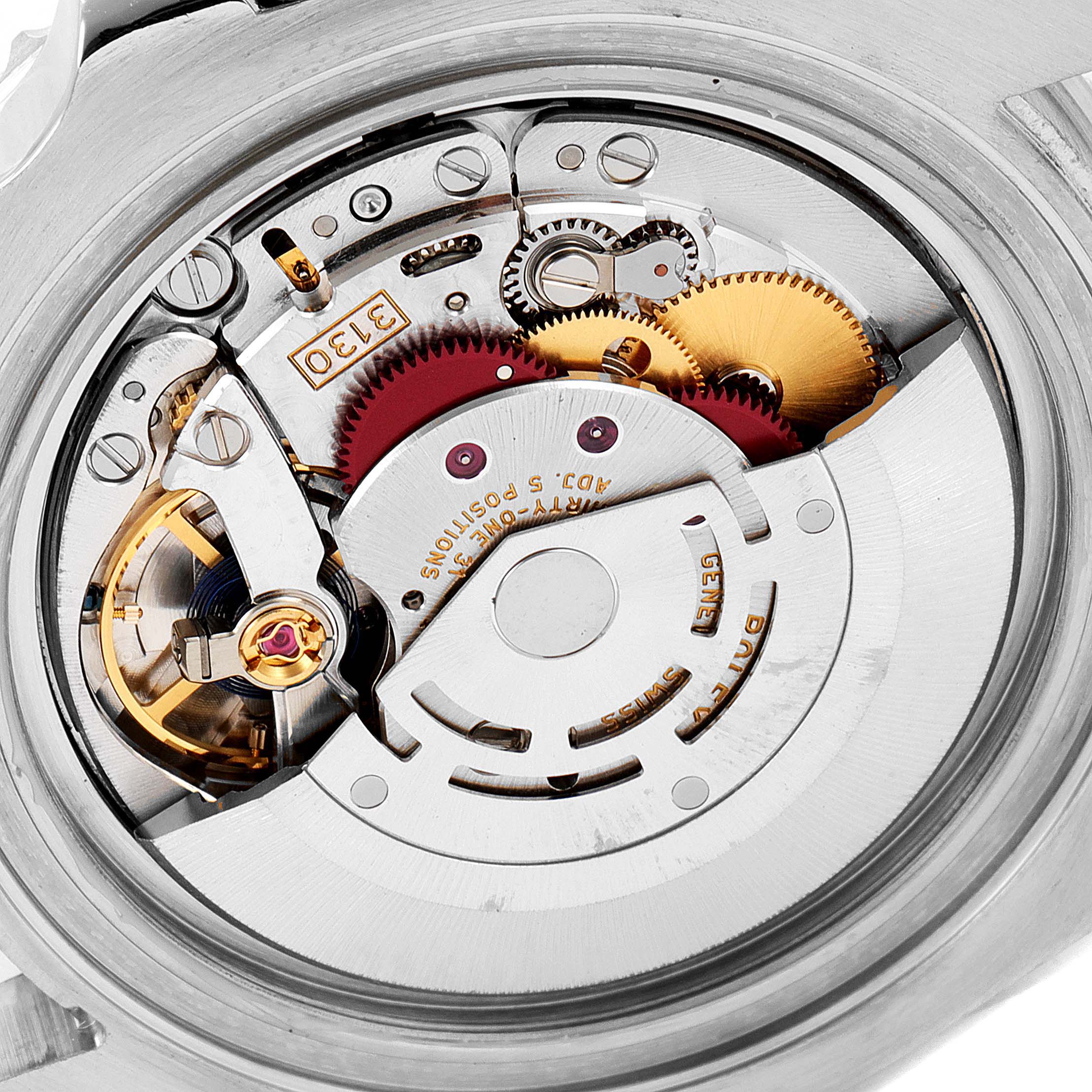 This image shows a close-up view of the internal mechanical movement of a Rolex Submariner 114060 Men
s Stainless Steel Black Dial 114060 Men
s Stainless Steel Black Dial watch.