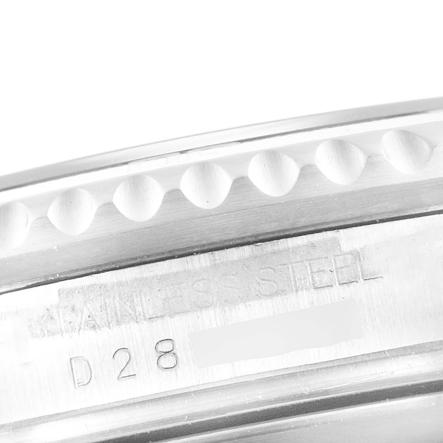 This image shows a close-up of the side of the casing and the bezel detail of a Rolex Submariner 16610 Men's Stainless Steel Black Dial 16610 Men's Stainless Steel Black Dial watch, revealing the "STAINLESS STEEL" engraving.