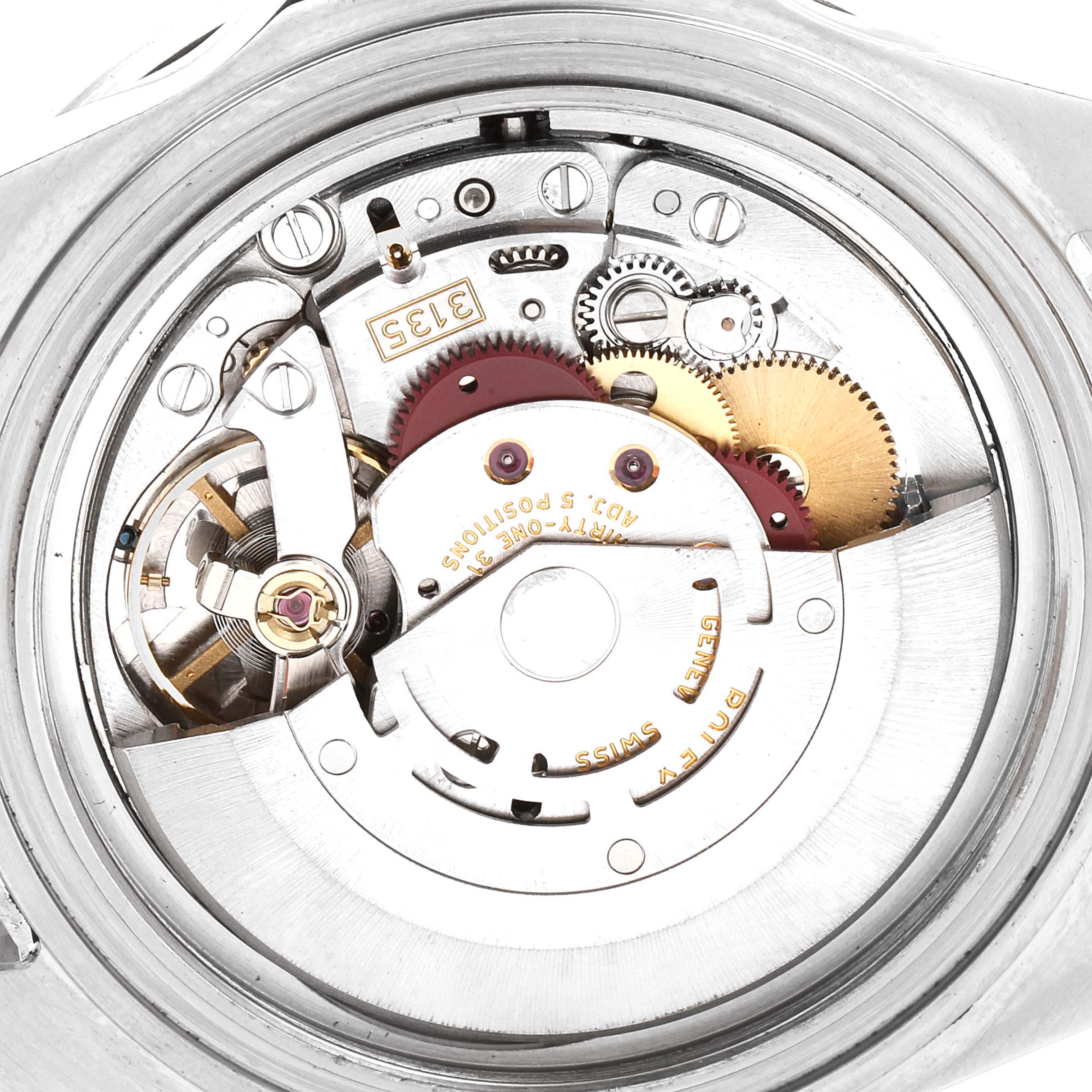 This image shows the back view of the Rolex Submariner 16610 Men's Stainless Steel Black Dial 16610 Men's Stainless Steel Black Dial watch, highlighting its intricate internal mechanism.