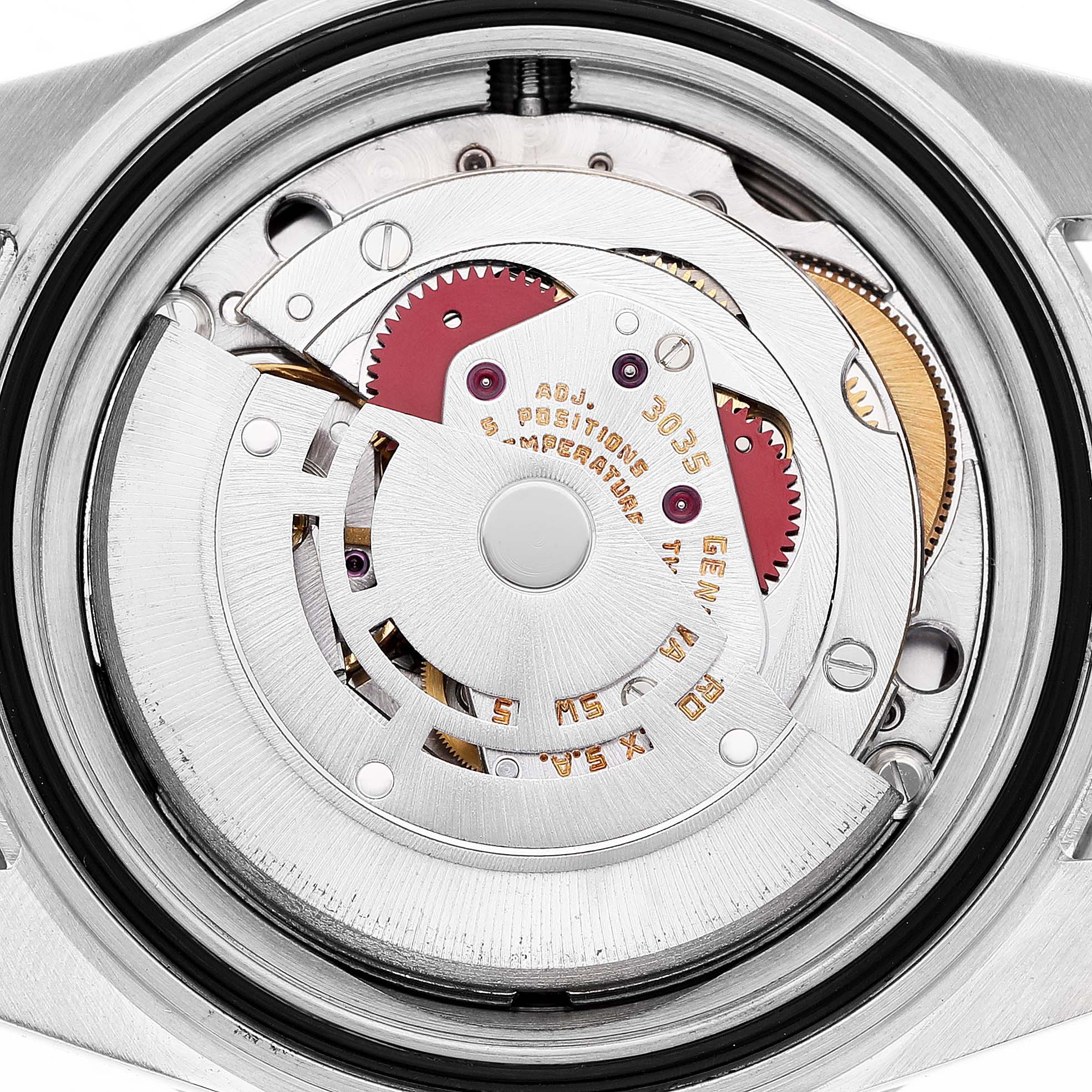 The image shows the back view of the Rolex Submariner 168000 Men's Stainless Steel Black Dial, focusing on its intricate movement components.