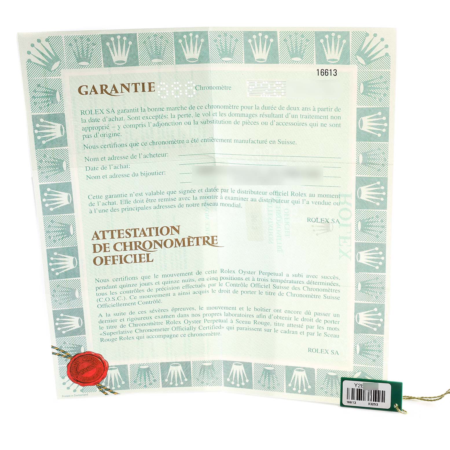 The image shows the warranty and official chronometer certification papers for a Rolex Submariner 16613 Men
s Steel and Gold (two tone) Blue Dial 16613 Men
s Steel and Gold (two tone) Blue Dial model.