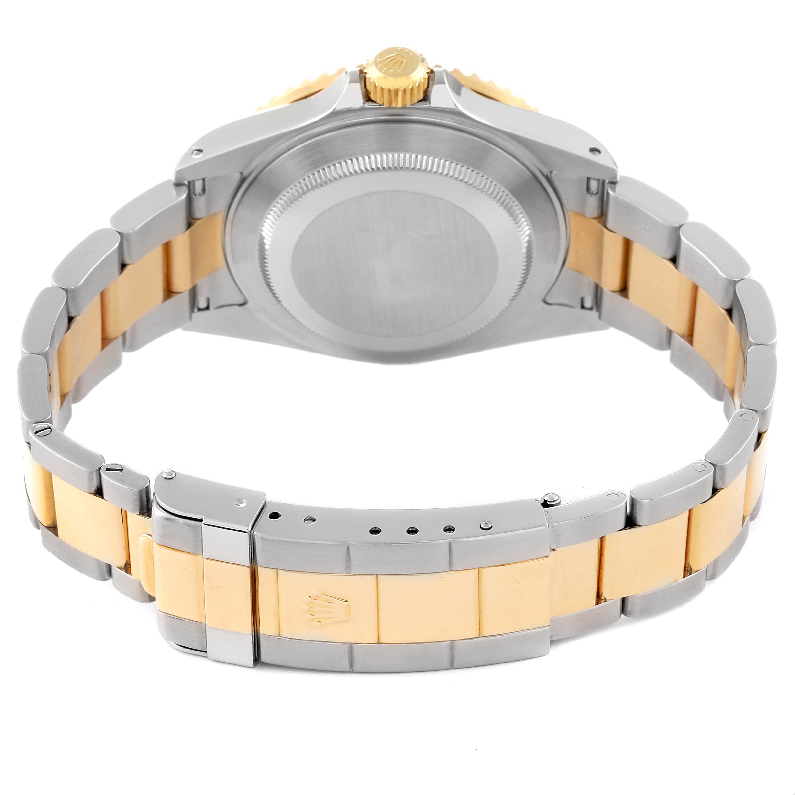 This image shows the back of a Rolex Submariner 16613 Men
s Steel and Gold (two tone) Blue Dial 16613 Men
s Steel and Gold (two tone) Blue Dial, highlighting the case back, crown, and two-tone bracelet.