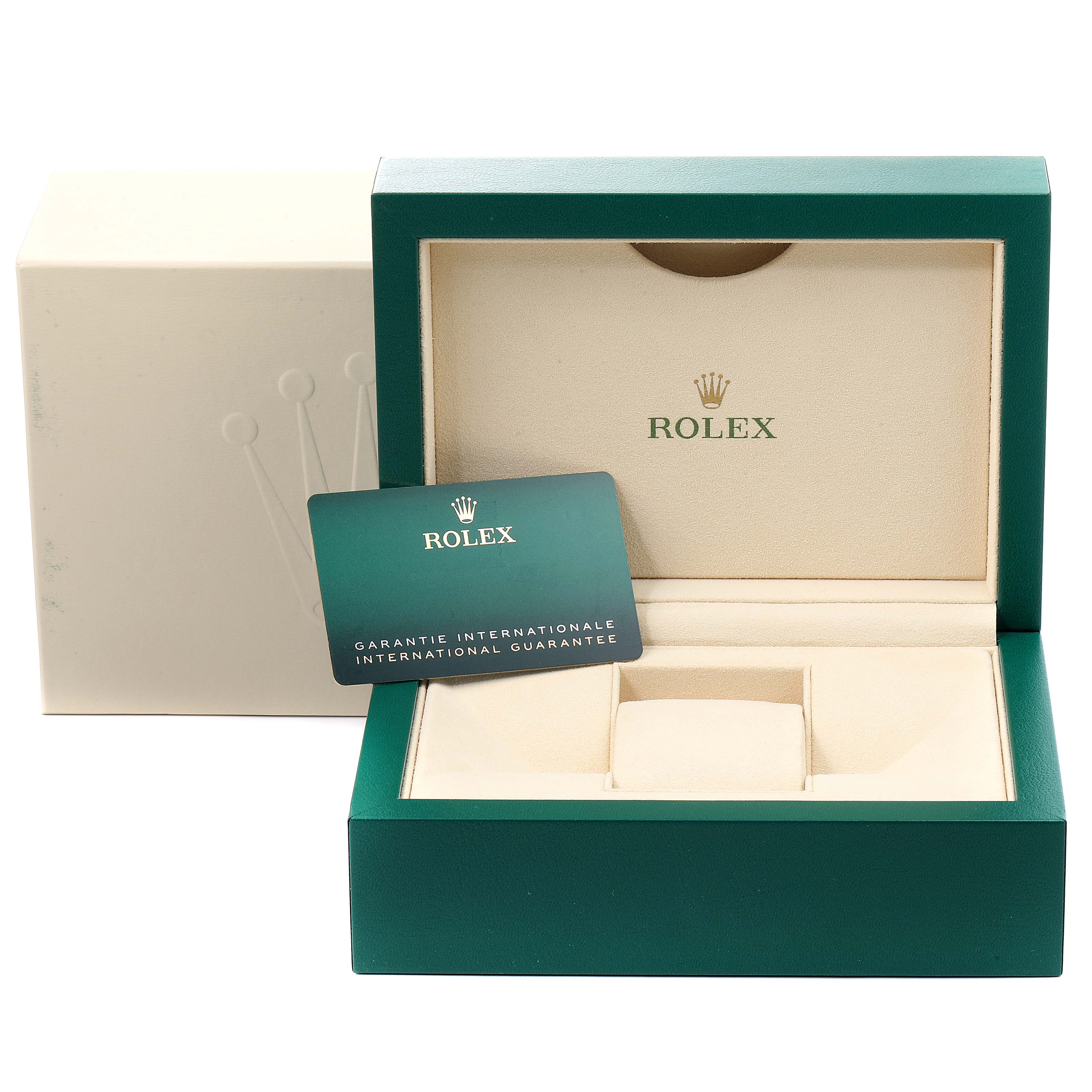 The image shows the open box and international guarantee card for a Rolex Submariner 126610LN Men's Stainless Steel Black Dial 126610LN Men's Stainless Steel Black Dial watch.