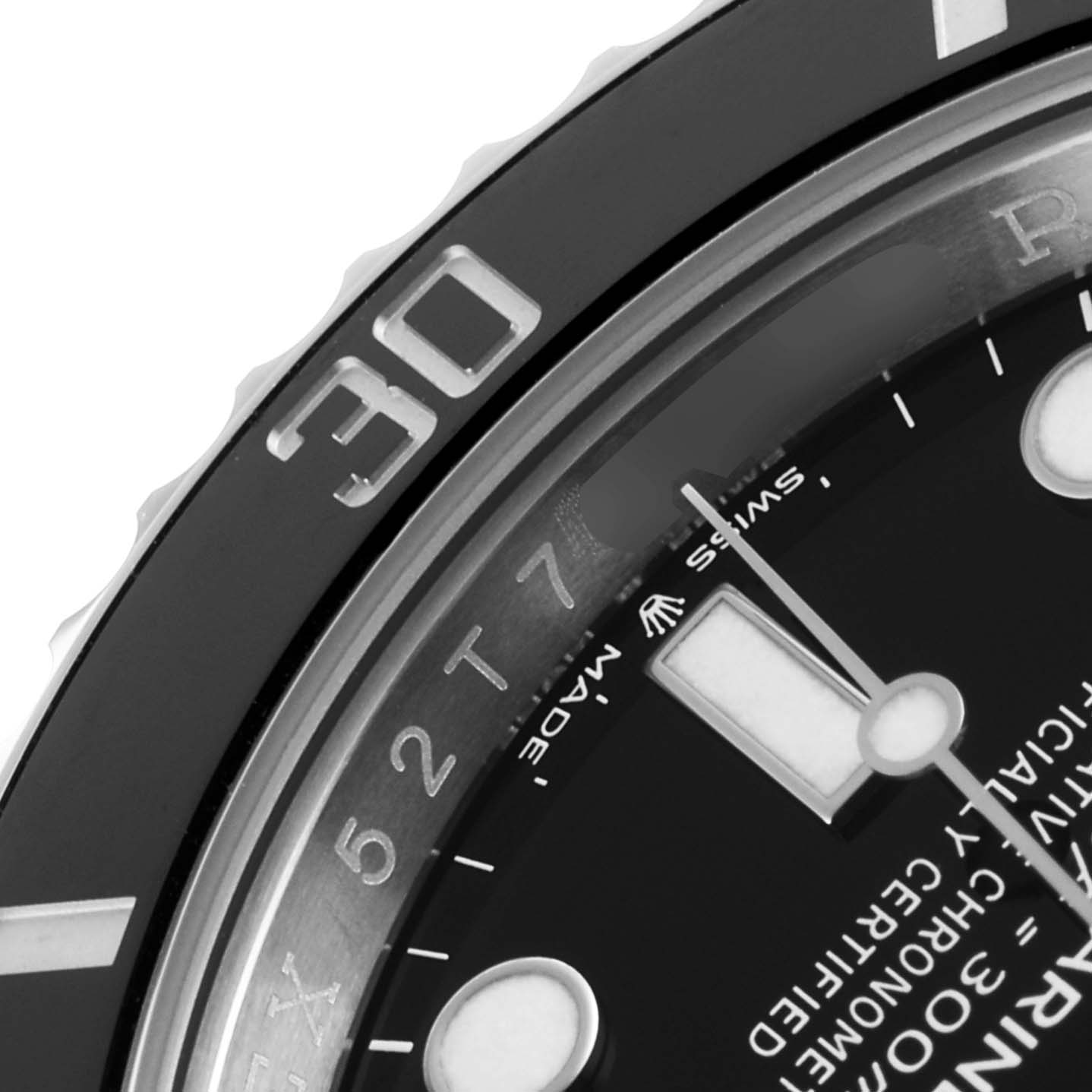 Close-up angle of the bezel and dial of the Rolex Submariner 126610LN Men's Stainless Steel Black Dial 126610LN Men's Stainless Steel Black Dial, showing the minute markers and part of the hour hand.