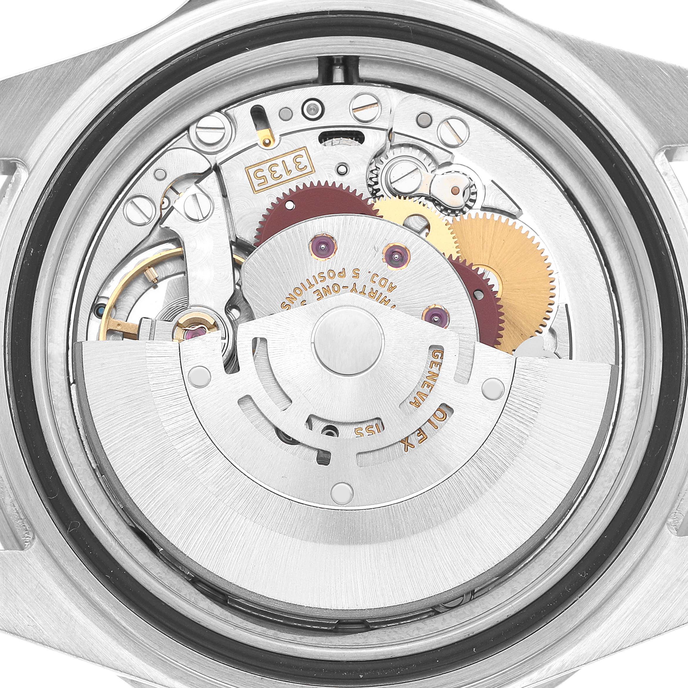 The image shows the movement of a Rolex Submariner 16610LV Men's Stainless Steel Black Dial watch from a top-down angle, displaying the intricate inner mechanisms.