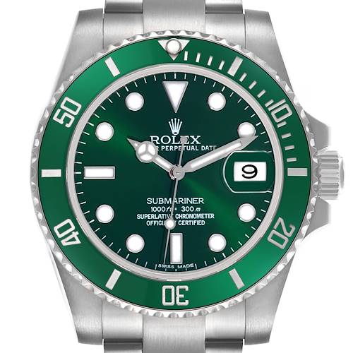 The Rolex Submariner is shown from a front angle, displaying the green bezel, dial, hands, markers, and date window.