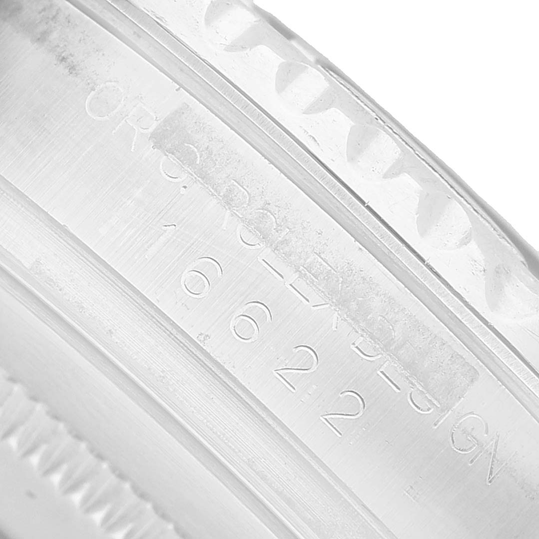 The image shows a close-up of the Rolex Yacht-Master 16622 Men's Stainless Steel Silver Dial's engraved inner bezel.