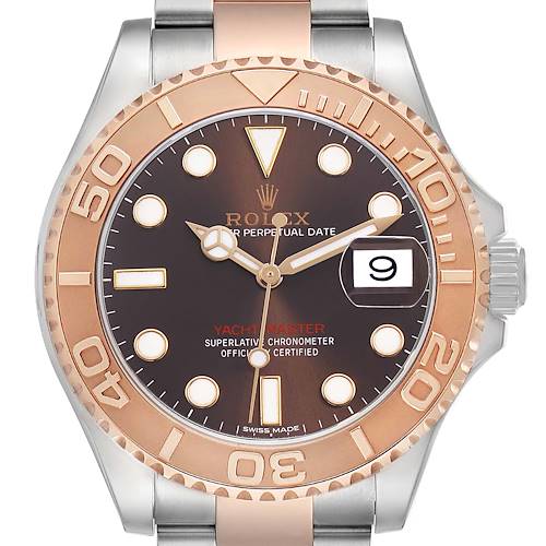 The Rolex Yacht-Master 116621 Men's Steel and Gold (two tone) Brown Dial watch is shown from the front, highlighting its bezel, dial, markers, hands, and date window.