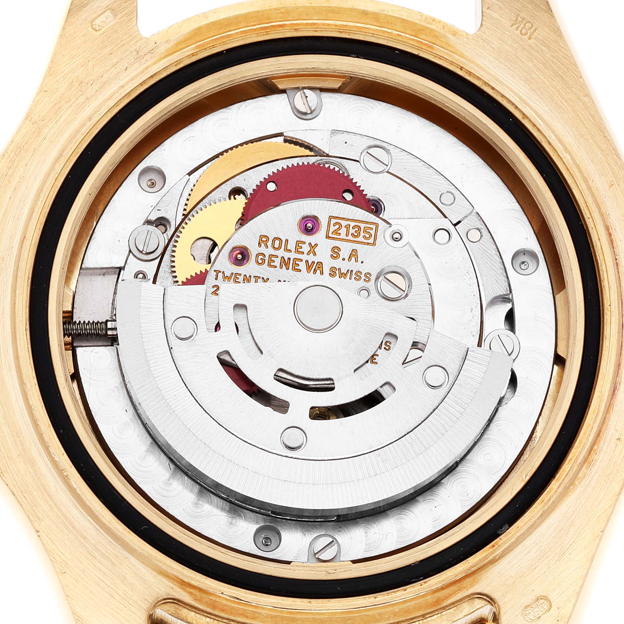 The image shows the movement and internal mechanics of a Rolex Yacht-Master 68628 Men's Yellow Gold Blue Dial 68628 Men's Yellow Gold Blue Dial watch from a back angle with the case removed.
