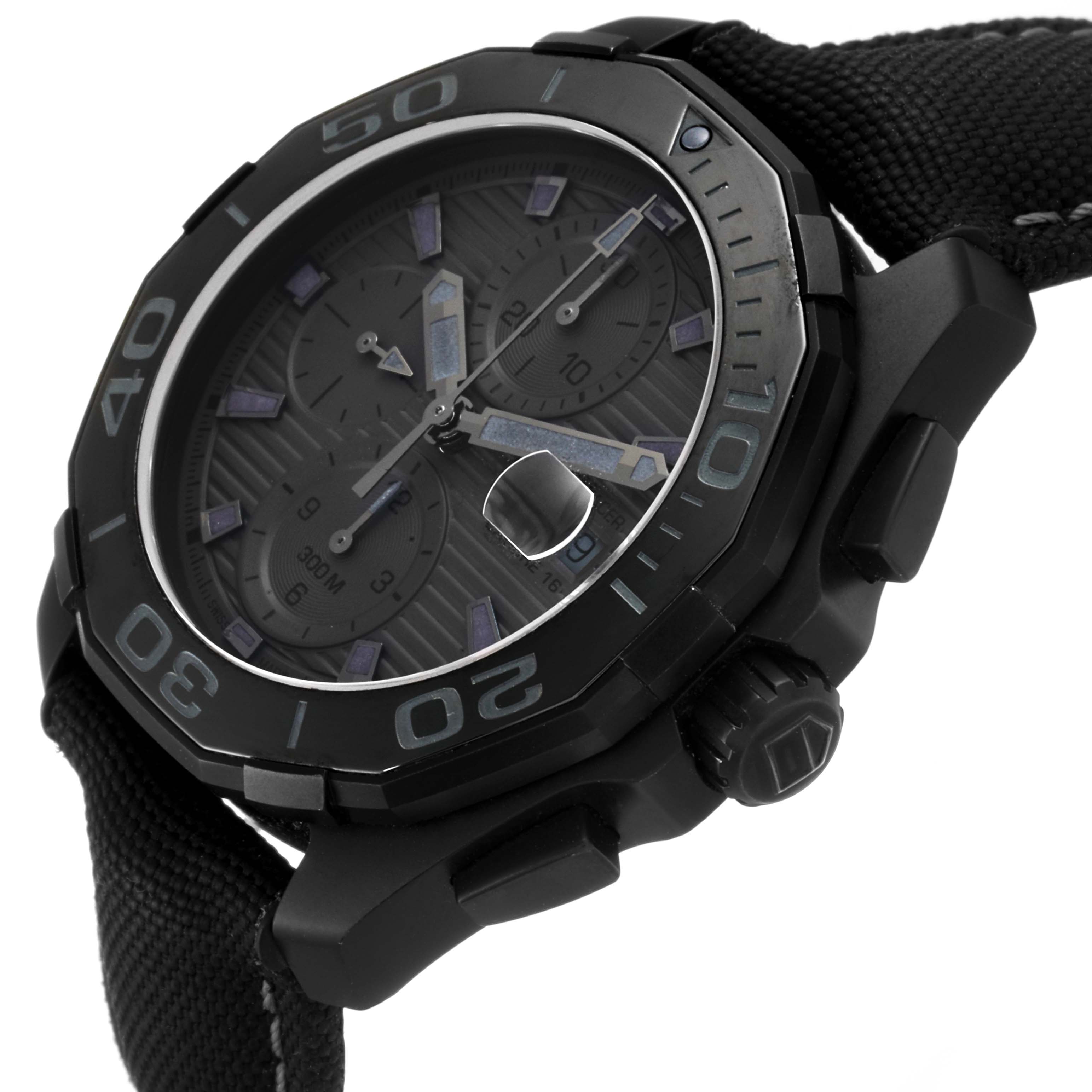 The image shows a semi-side view of a Tag Heuer Aquaracer CAY218B.FC6370 Men's Titanium Black Dial CAY218B.FC6370 Men's Titanium Black Dial watch, highlighting the bezel, dial, and crown.