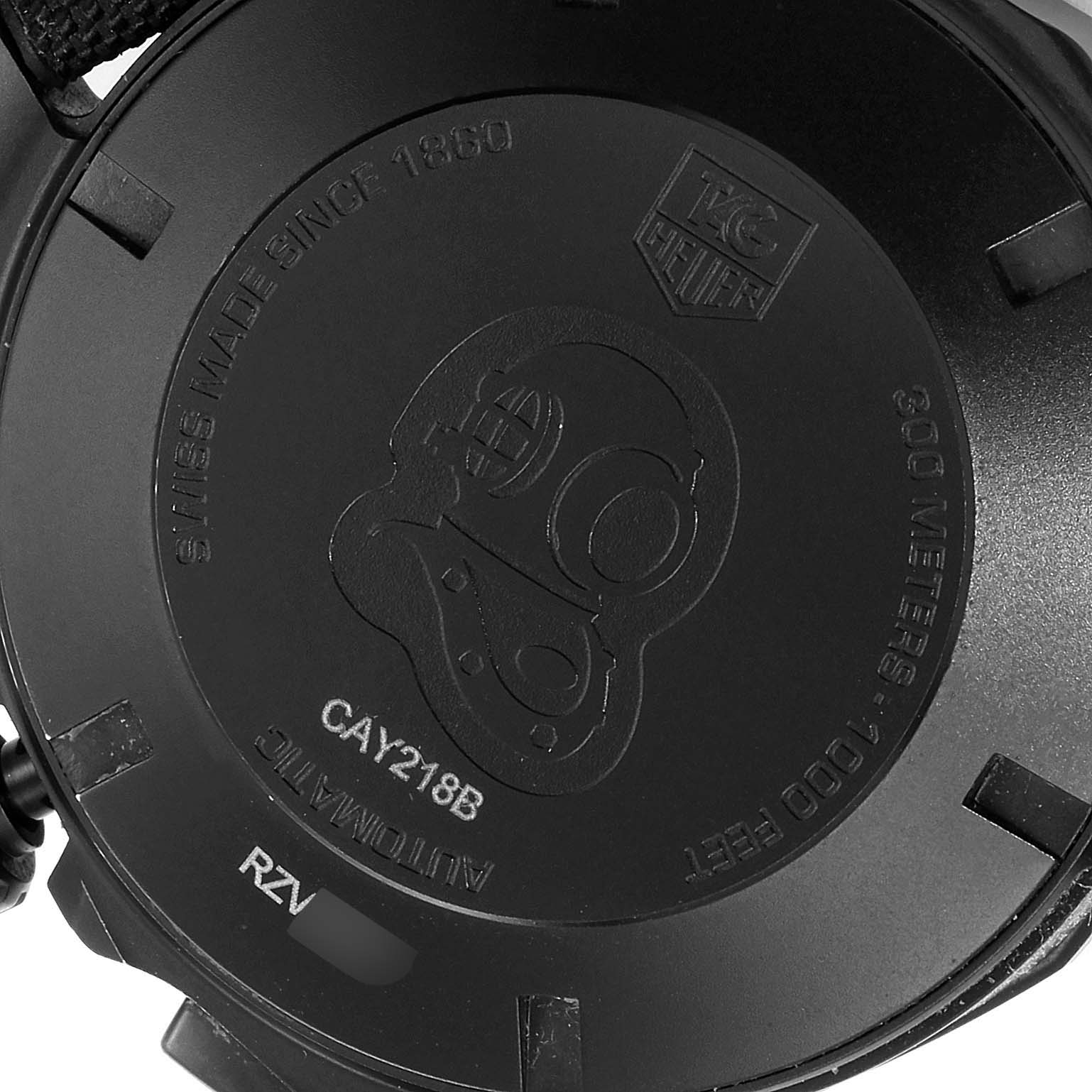 The image shows the back case of a Tag Heuer Aquaracer CAY218B.FC6370 Men's Titanium Black Dial CAY218B.FC6370 Men's Titanium Black Dial model watch, highlighting engraving details and water resistance.