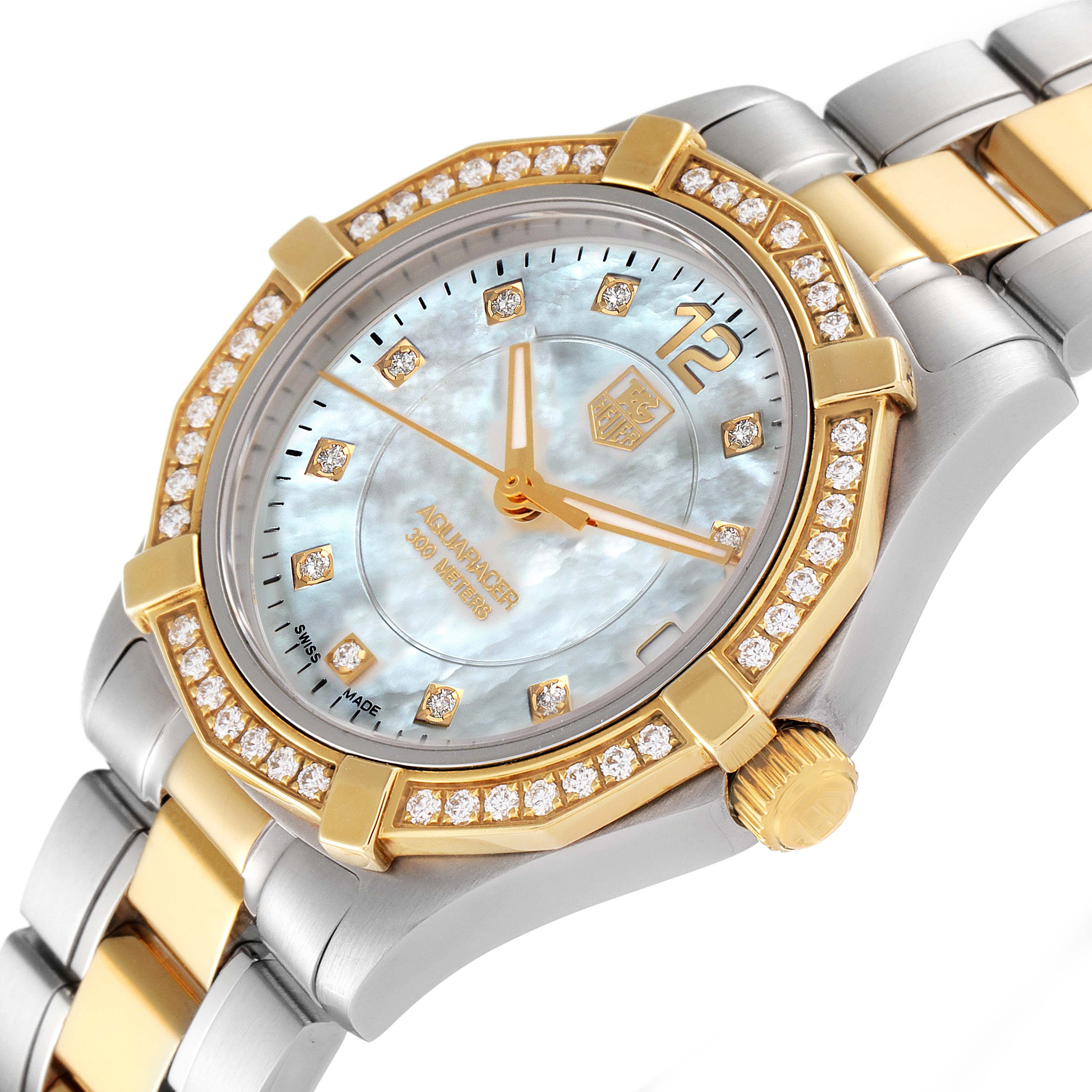 The image shows a close-up angle of a Tag Heuer Aquaracer WAF1450.BB0820 Women
s Steel and Gold (two tone) Mother of Pearl Dial WAF1450.BB0820 Women
s Steel and Gold (two tone) Mother of Pearl Dial watch, highlighting its face, bezel, crown, and part of the bracelet.