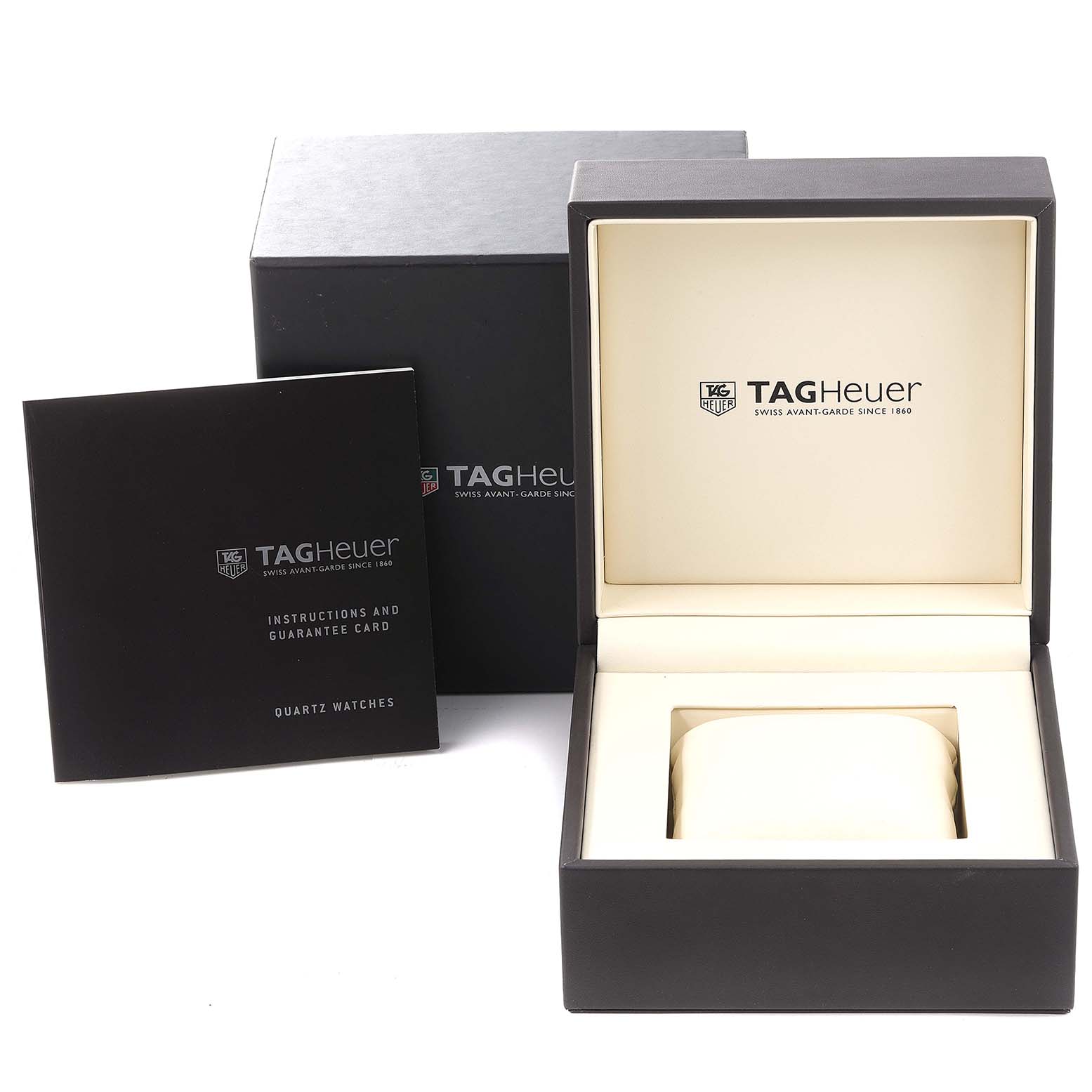 The image shows the packaging and manual for a Tag Heuer Aquaracer WAF1450.BB0820 Women
s Steel and Gold (two tone) Mother of Pearl Dial WAF1450.BB0820 Women
s Steel and Gold (two tone) Mother of Pearl Dial watch, including the watch box and guarantee card.