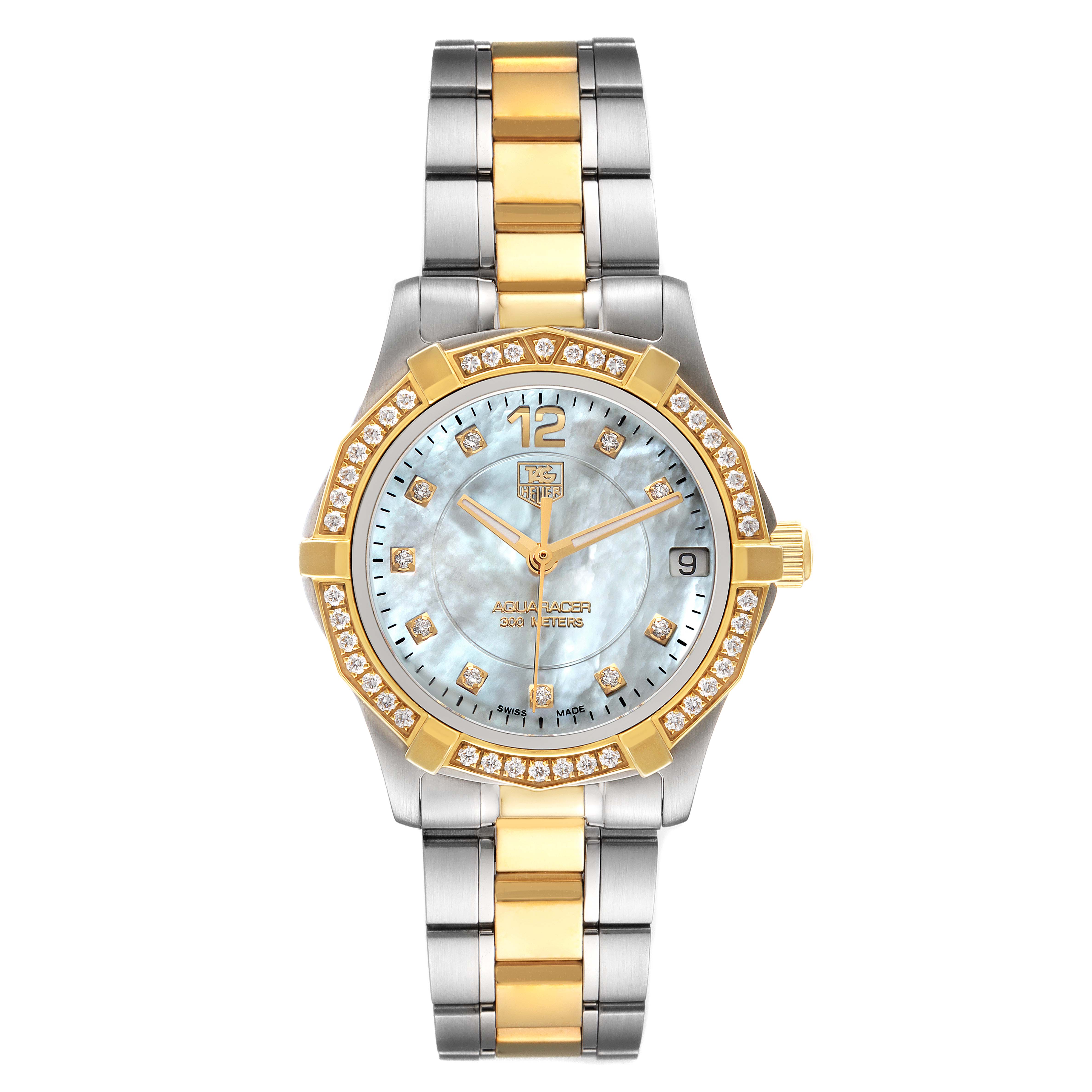 The image shows a front view of a Tag Heuer Aquaracer WAF1450.BB0820 Women
s Steel and Gold (two tone) Mother of Pearl Dial WAF1450.BB0820 Women
s Steel and Gold (two tone) Mother of Pearl Dial watch, highlighting its gold and silver bracelet, diamond-studded bezel, and face.