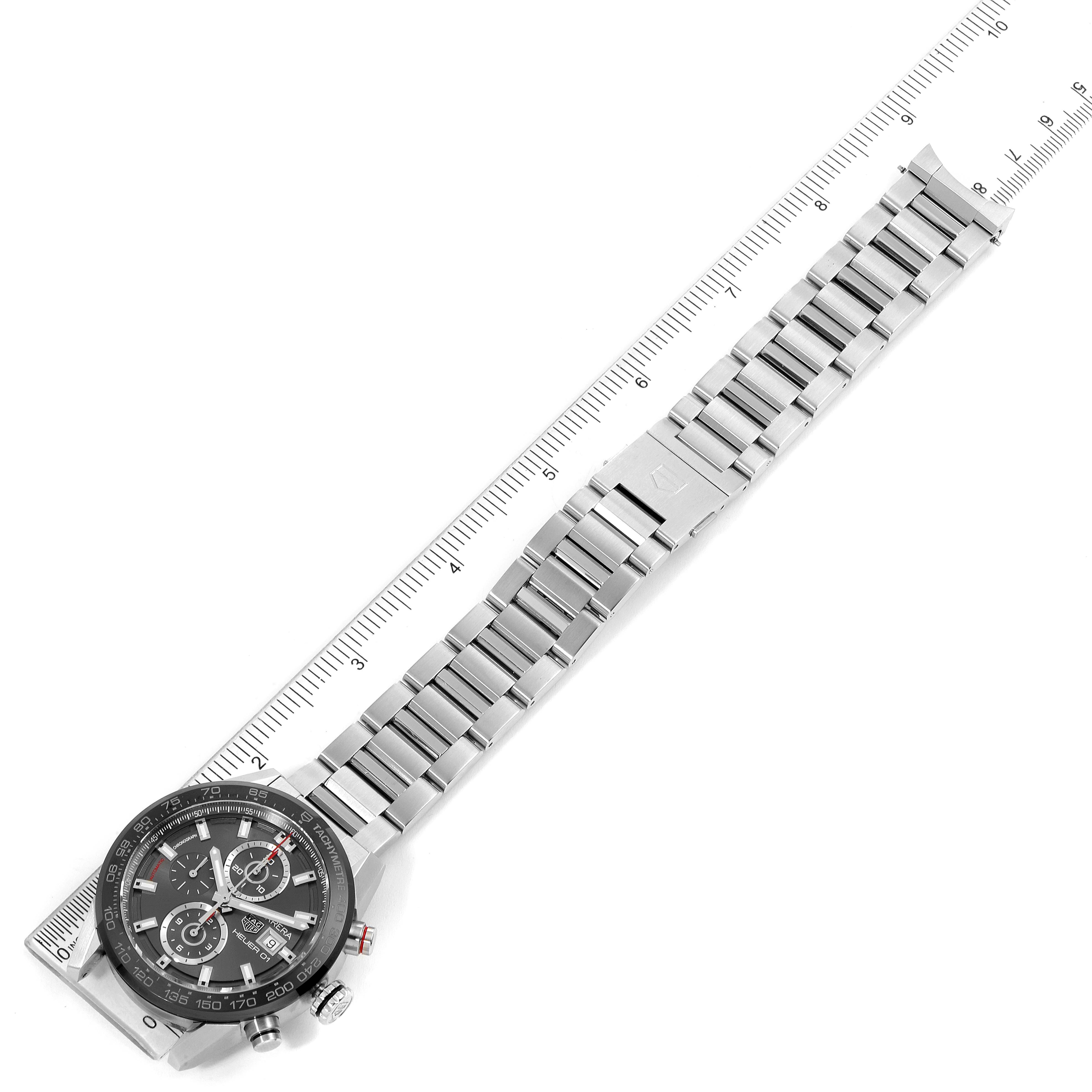 The image shows a Tag Heuer Carrera CAR201W.BA0714 Men
s Stainless Steel Black Dial CAR201W.BA0714 Men
s Stainless Steel Black Dial watch at a top-down angle, displaying its face, bezel, bracelet, and clasp.