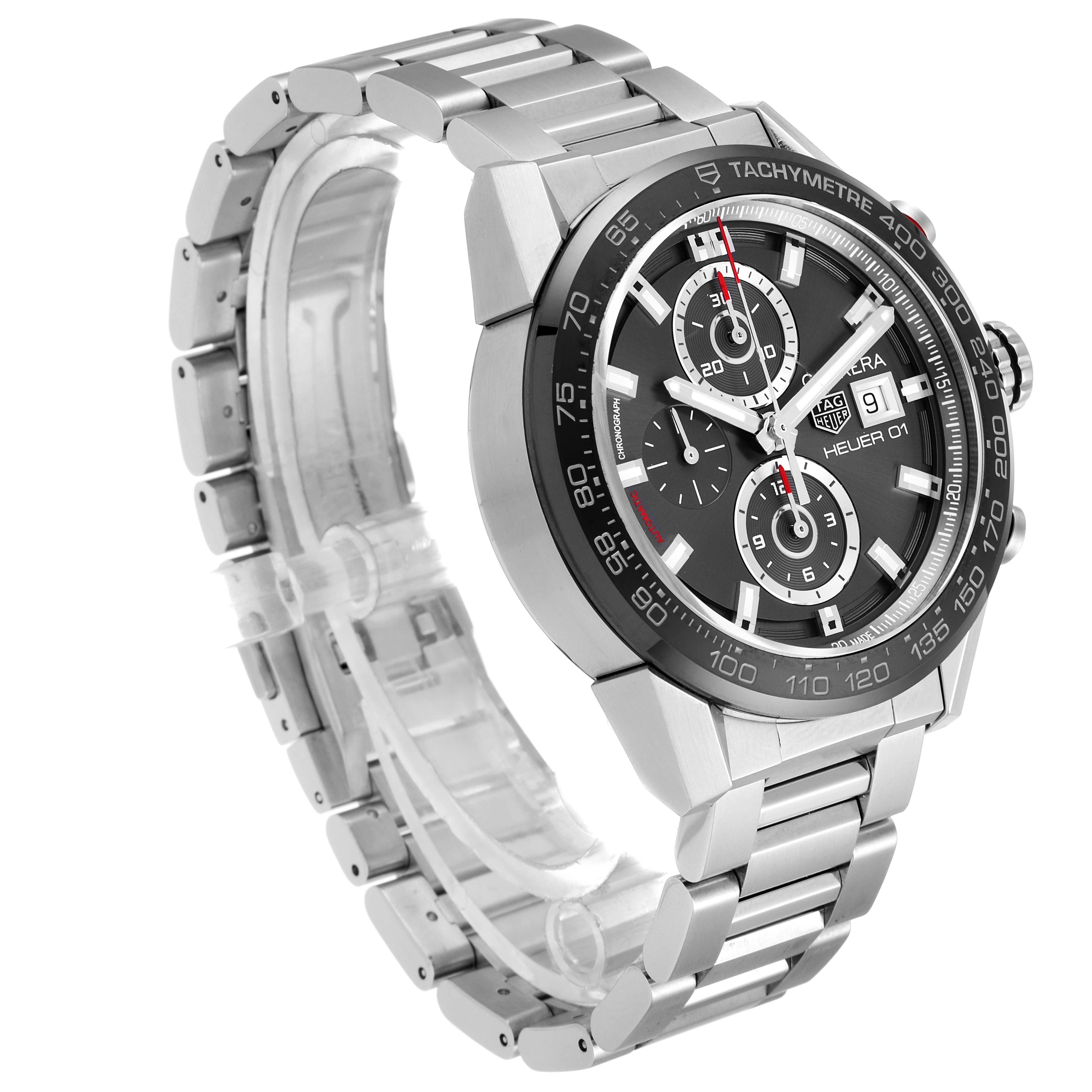 The image shows a side-angle view of the Tag Heuer Carrera CAR201W.BA0714 Men
s Stainless Steel Black Dial CAR201W.BA0714 Men
s Stainless Steel Black Dial watch, highlighting its stainless steel bracelet and detailed dial.