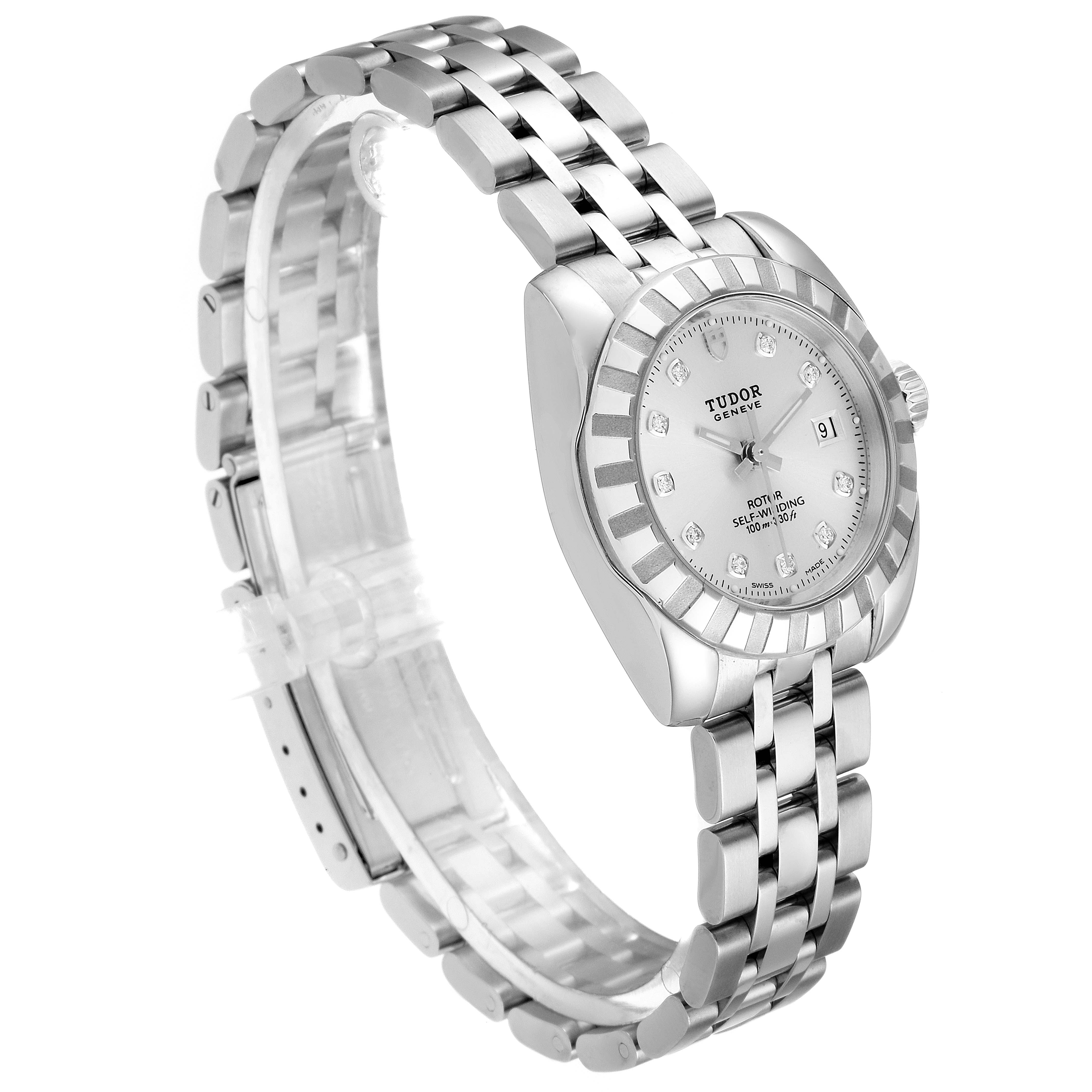 The Tudor Classic 22010 Women's Stainless Steel Silver Dial 22010 Women's Stainless Steel Silver Dial model watch is shown at an angle, displaying its face, bezel, and bracelet.