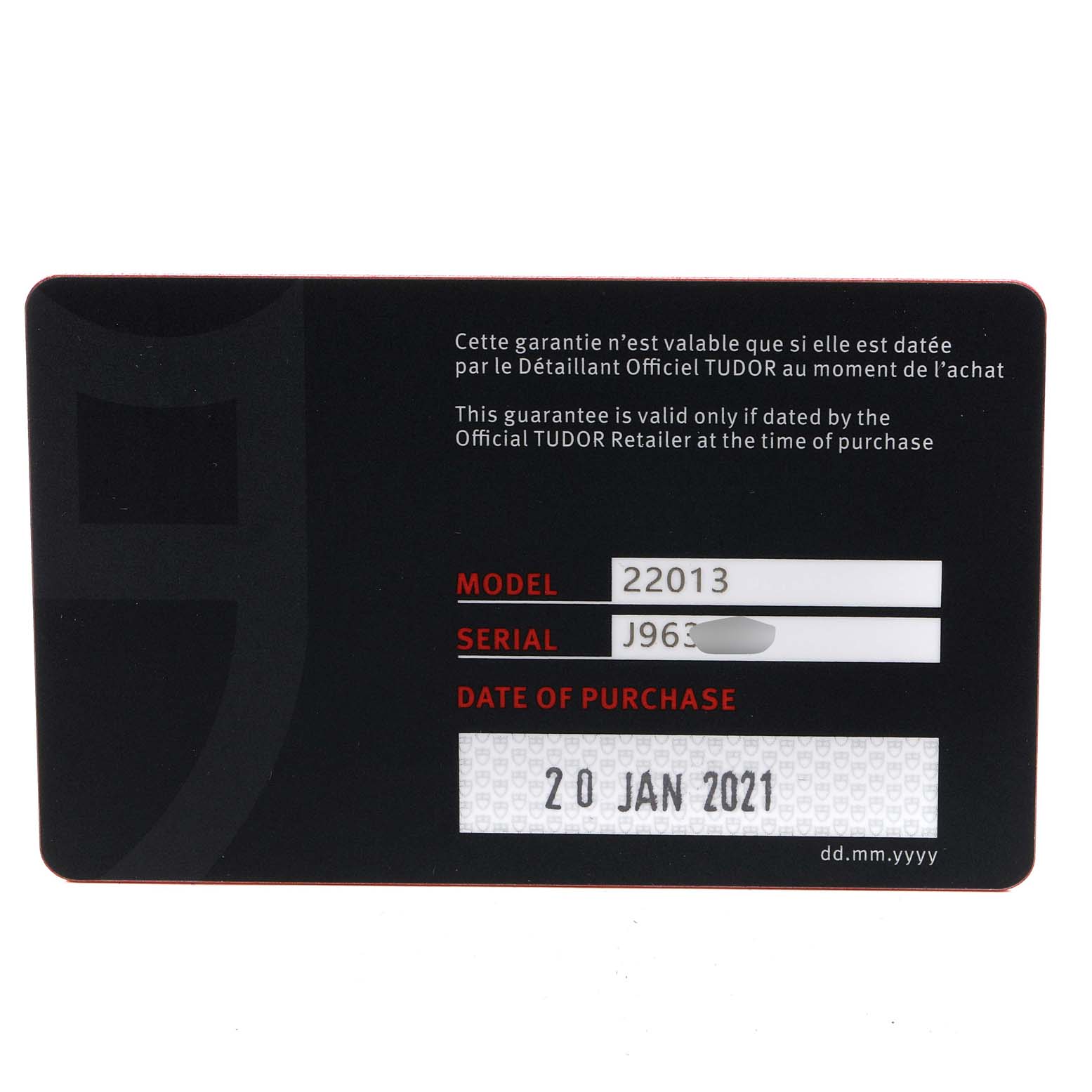 This is a warranty card for the Classic model by Tudor, showing model and serial numbers, and the date of purchase.