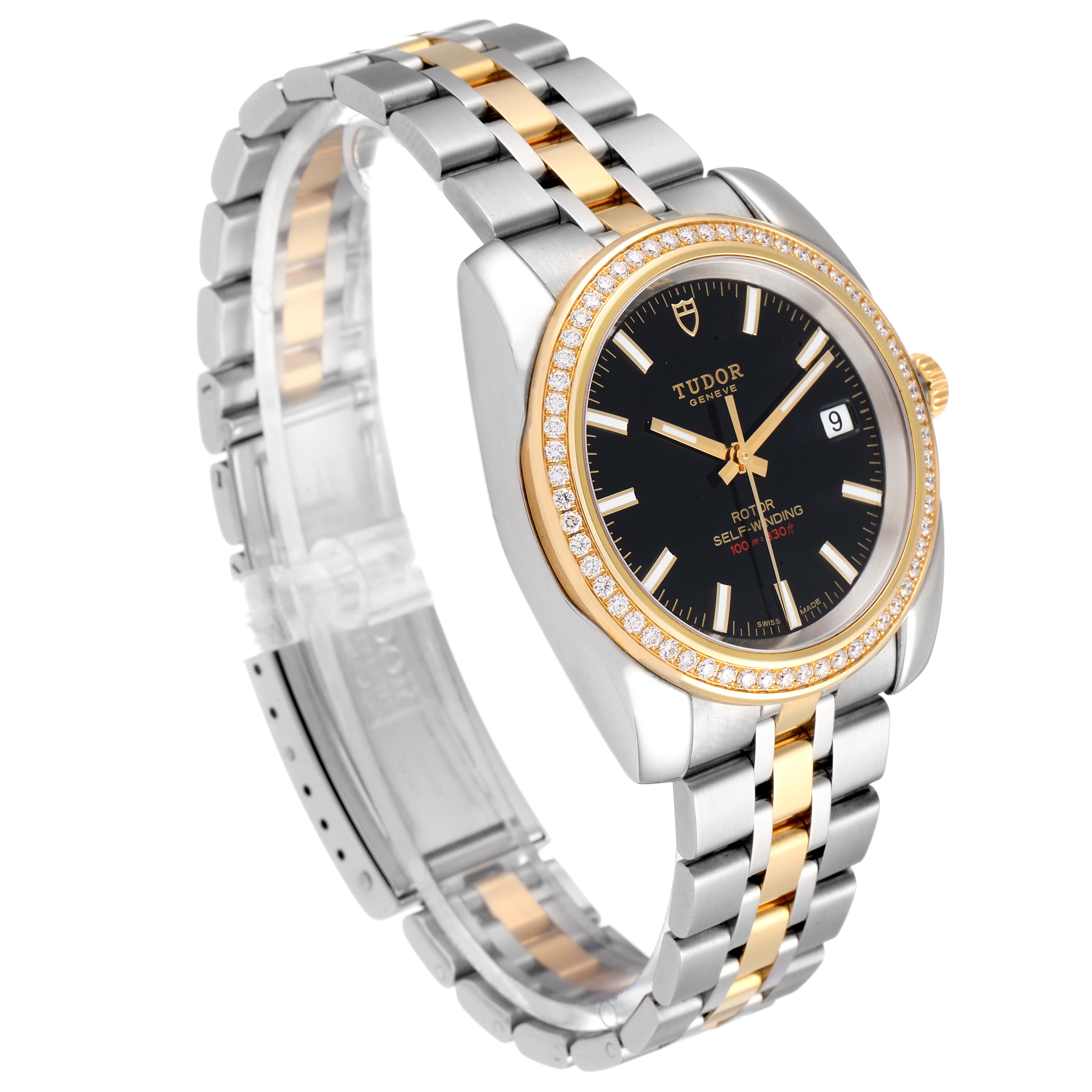 The Tudor Classic 21023 Men's Steel and Gold (two tone) Black Dial 21023 Men's Steel and Gold (two tone) Black Dial model watch is shown at an angle highlighting its black dial, two-tone bracelet, and date window.