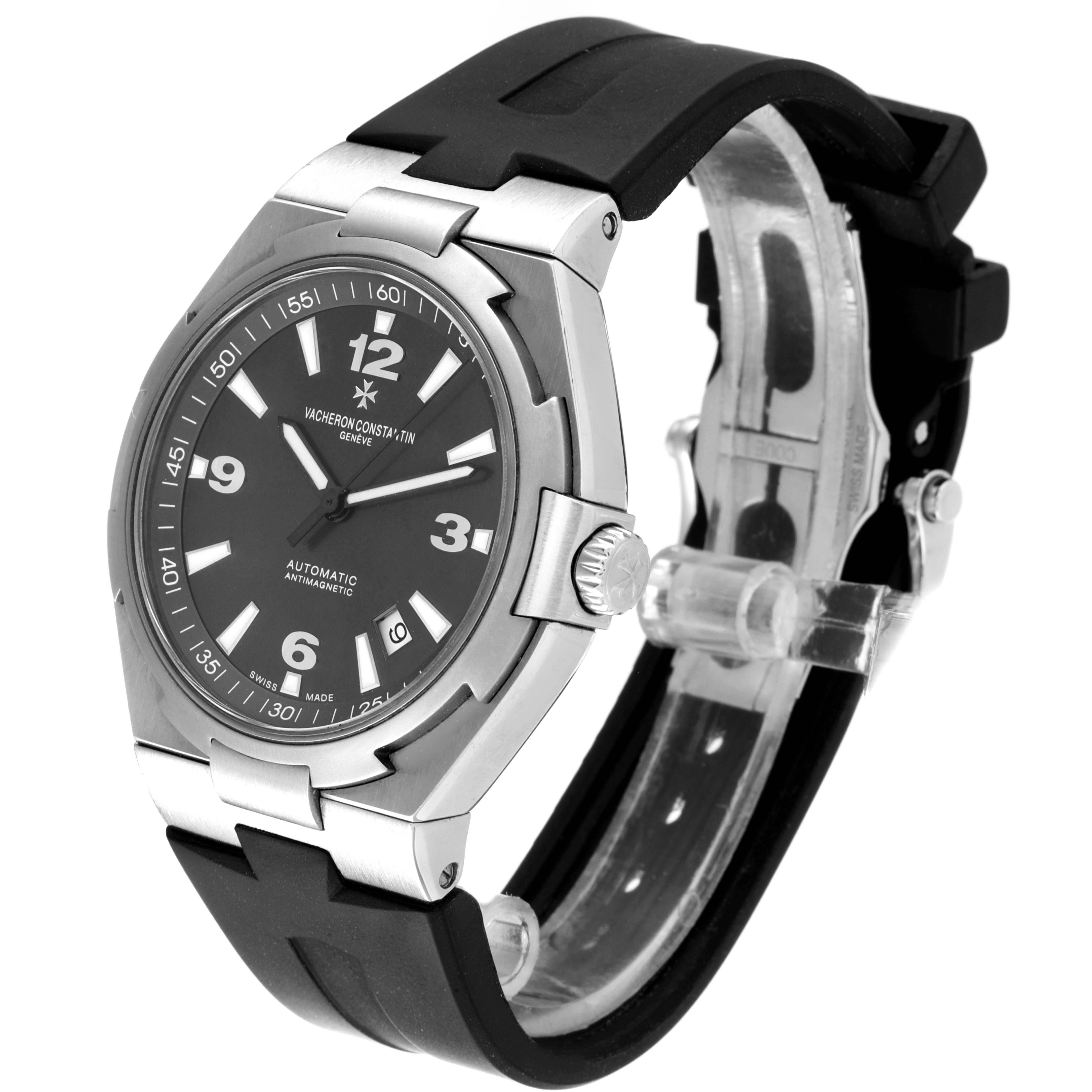 The image shows a side view of the Vacheron Constantin Overseas 47040/000W-9500 Men's Stainless Steel Black Dial 47040/000W-9500 Men's Stainless Steel Black Dial watch, highlighting its face, bezel, and black strap.