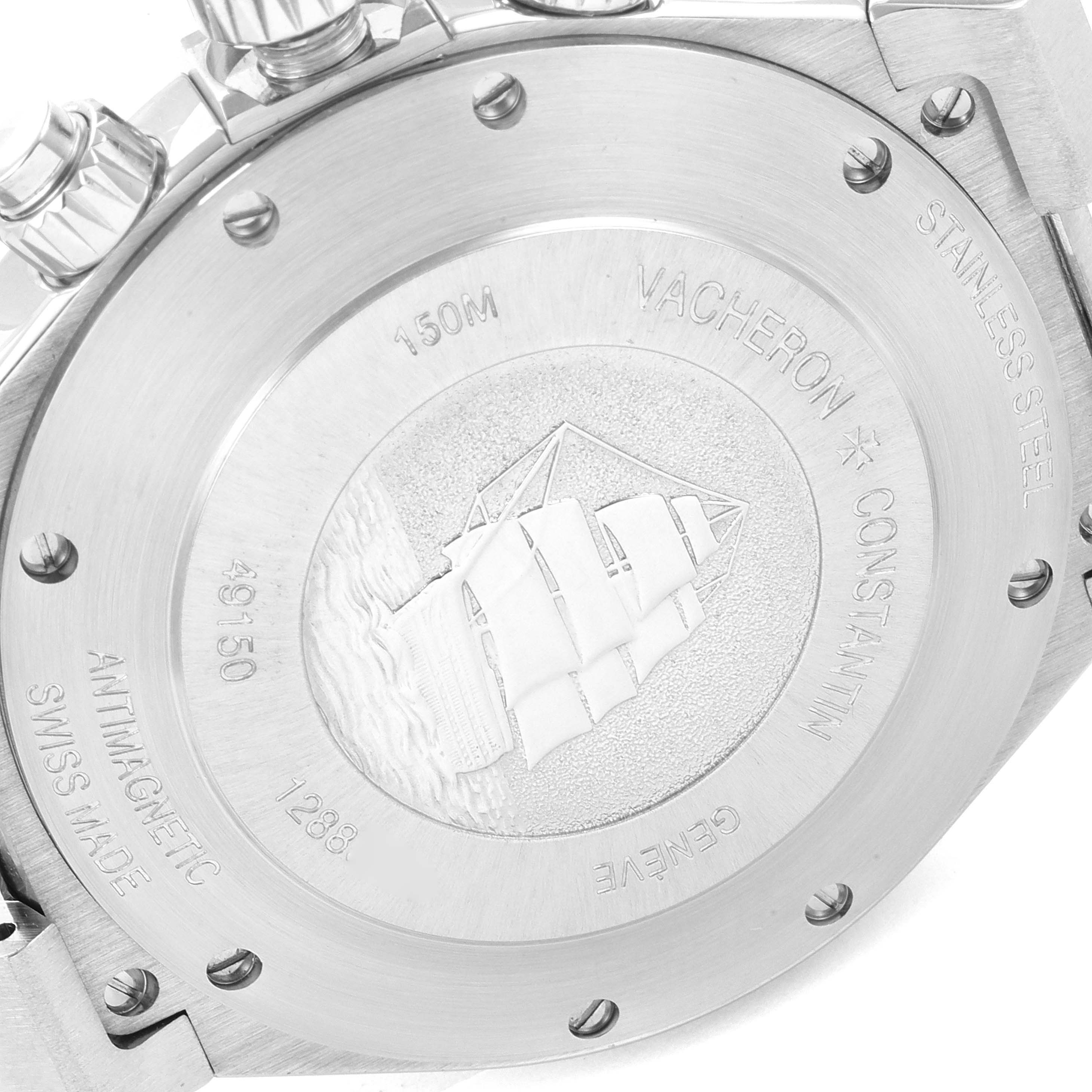 The image shows the back case of a Vacheron Constantin Overseas 49150/000A-9017 Men's Stainless Steel Silver Dial 49150/000A-9017 Men's Stainless Steel Silver Dial watch, highlighting the engraved design and inscriptions.