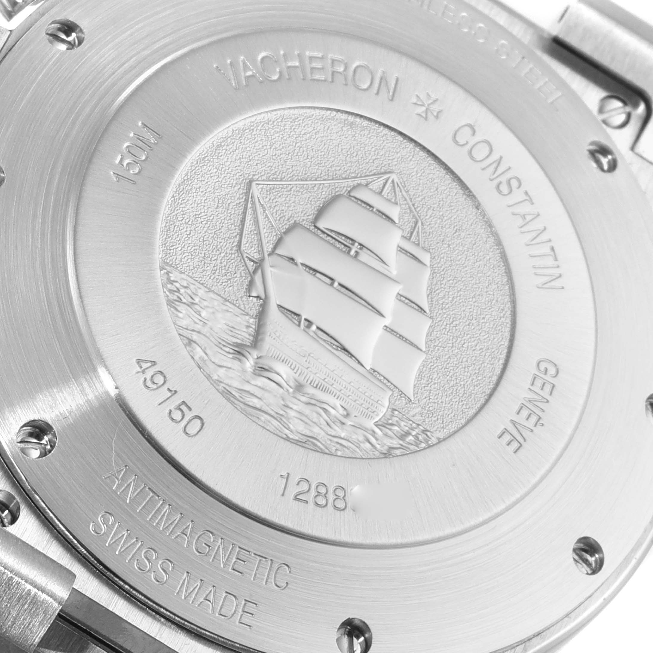 The image shows the case back of a Vacheron Constantin Overseas 49150/000A-9017 Men's Stainless Steel Silver Dial 49150/000A-9017 Men's Stainless Steel Silver Dial watch, featuring an engraved ship and various inscriptions.
