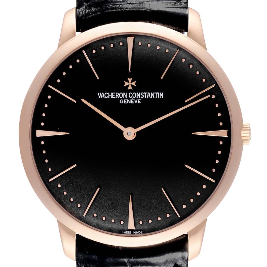 The Vacheron Constantin Patrimony watch is shown from the front, highlighting the black dial, gold hands, indices, and crown.