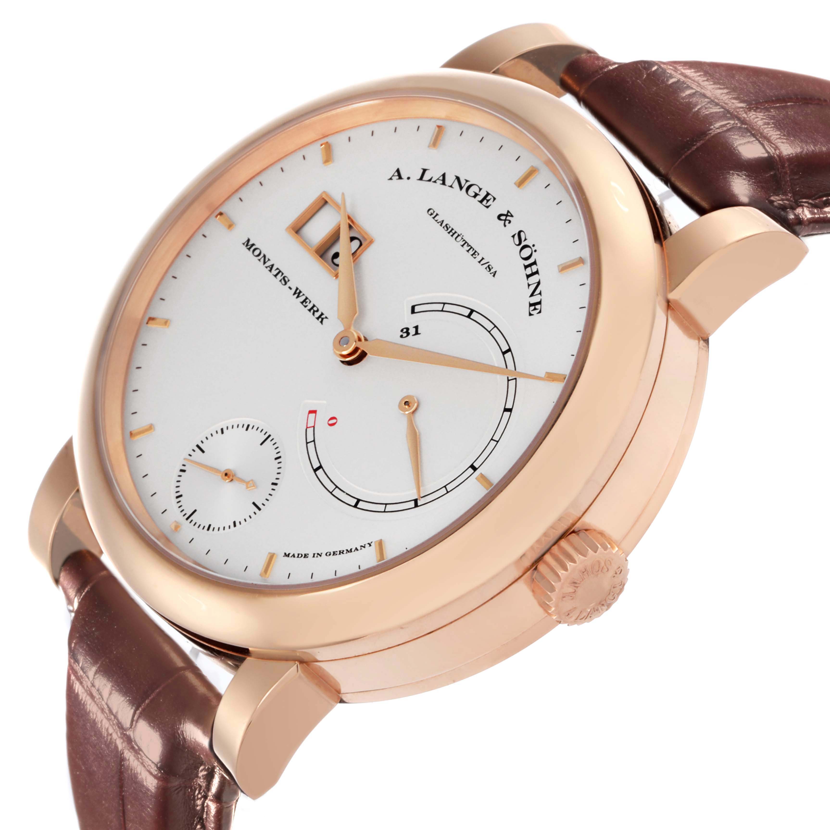 The A. Lange & Sohne Lange 1 130.032F Men's Rose Gold Silver Dial watch is shown at a three-quarter angle, revealing the dial, hands, case, lugs, and part of the leather strap.
