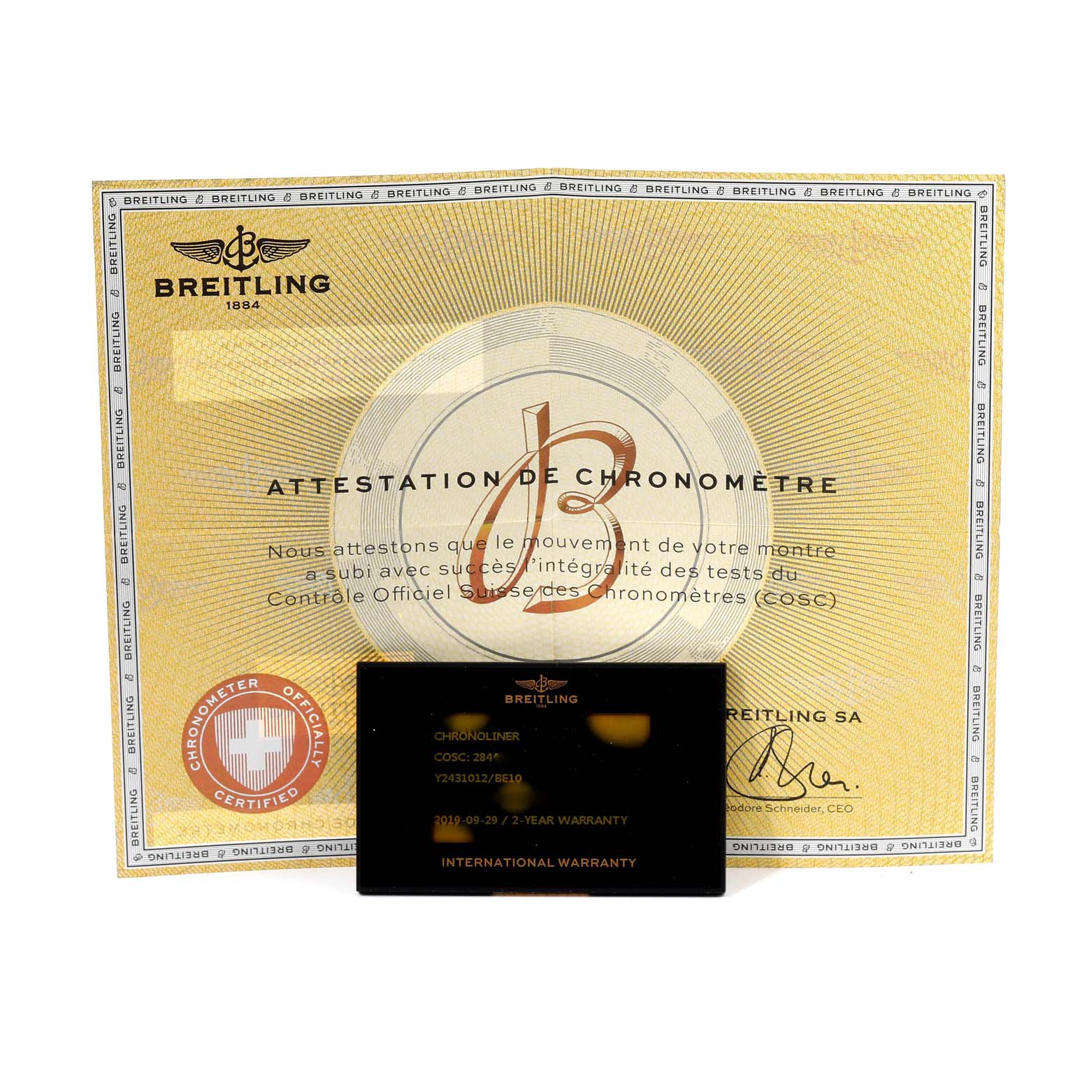 The image shows the certification and warranty card for a Breitling Chronoliner Y2431012/BE10 Men's Stainless Steel Black Dial Y2431012/BE10 Men's Stainless Steel Black Dial watch.