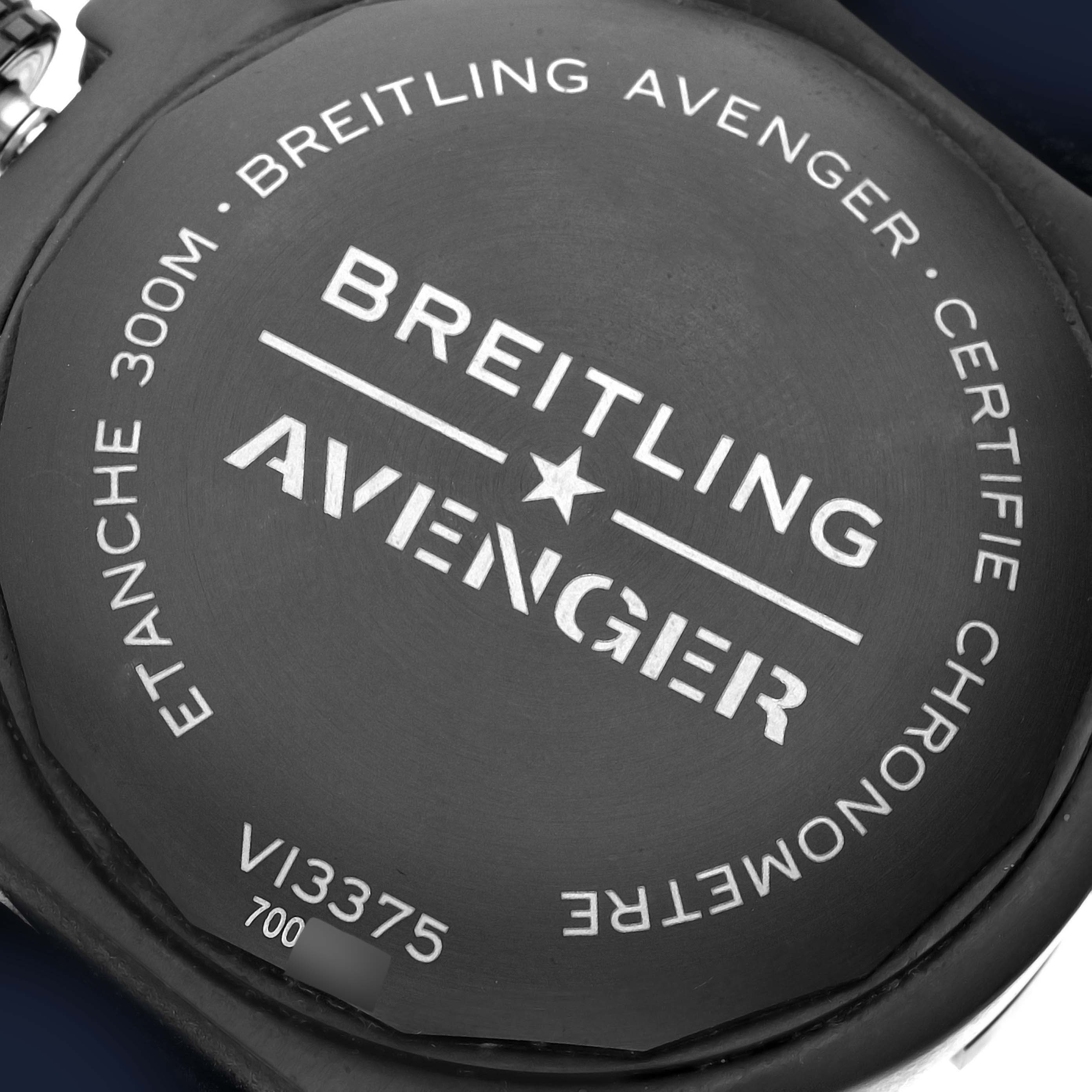 The image shows the back case of a Breitling Avenger V13375 Men's Titanium Blue Dial watch, highlighting its branding and specifications.