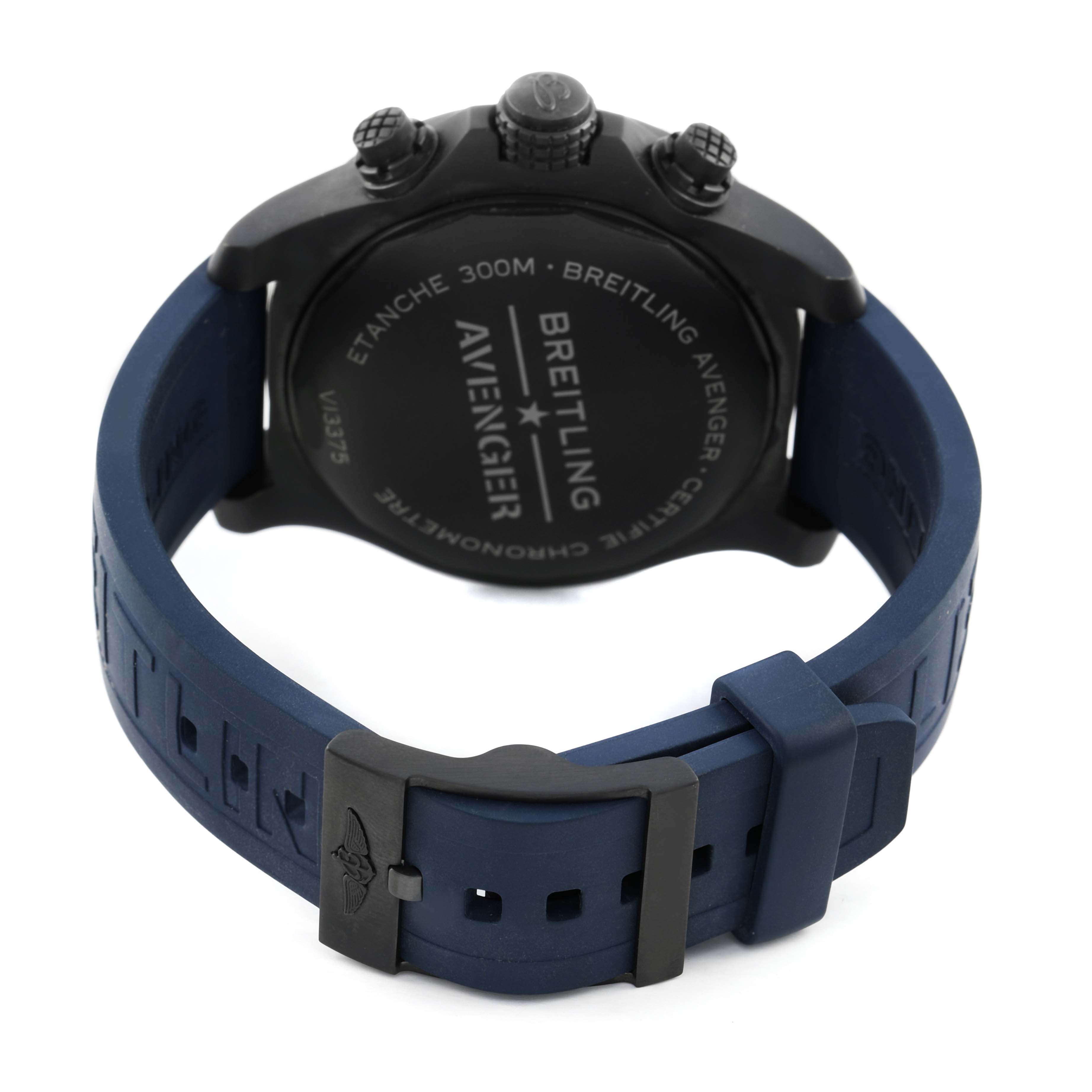 The image shows the back of a Breitling Avenger V13375 Men's Titanium Blue Dial watch, featuring the caseback, buckle, and navy strap.